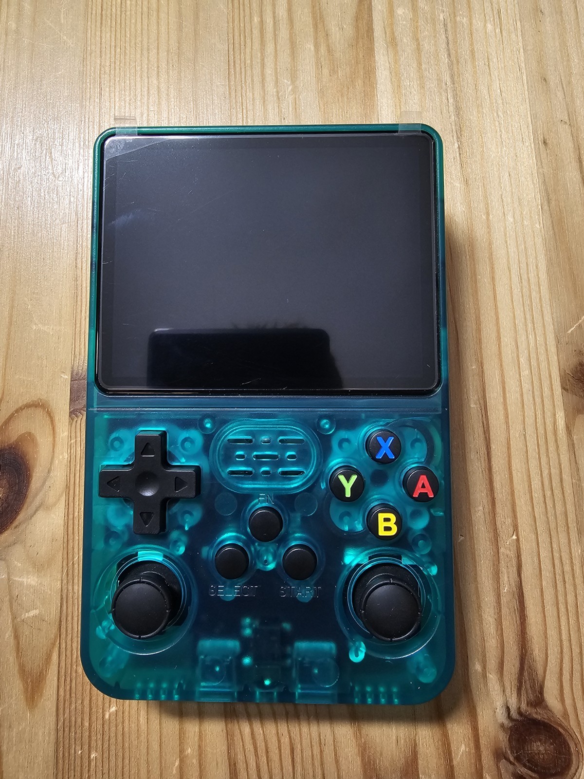 R36S Handheld Video Game Console. Arkos System (Tran Green) 64GB