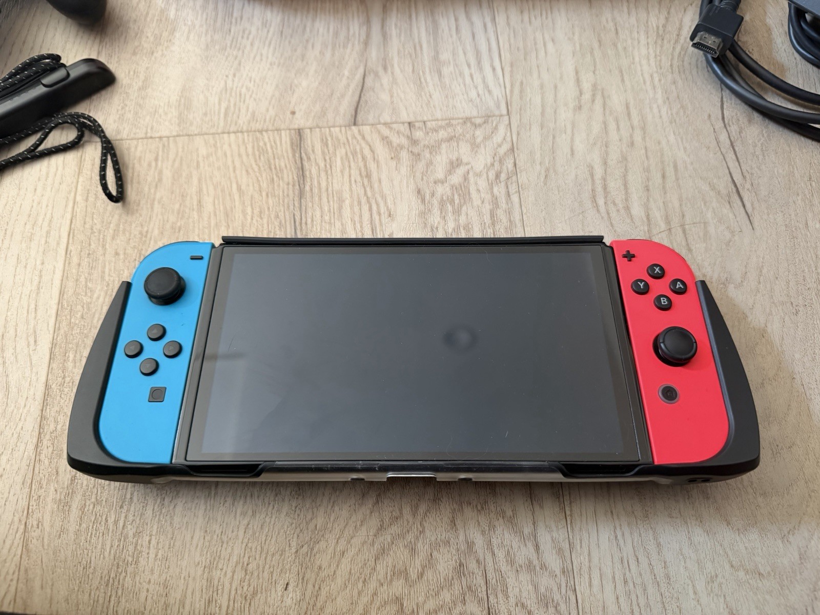 Nintendo Switch OLED 64GB Neon Blue/Red | Bundled w/ Grip Case & Carrying Case