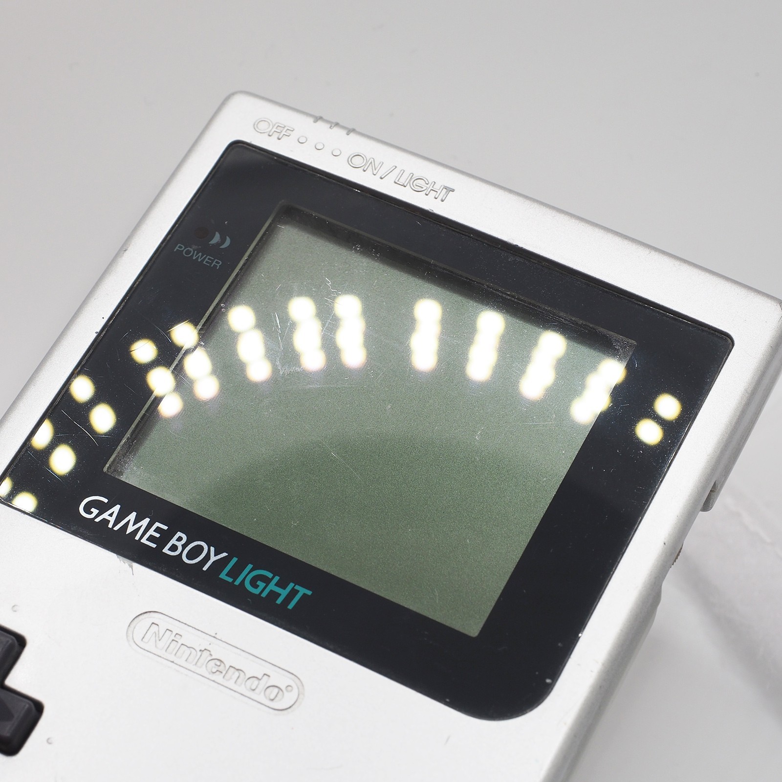 Nintendo Game Boy Light SILVER console MGB-101 WORKING CLEANED #0141_32[VG]
