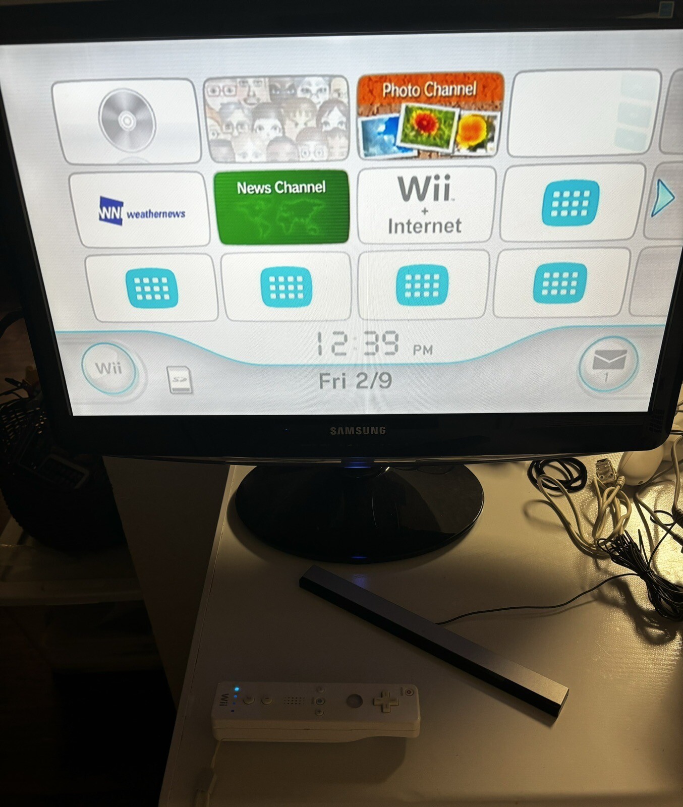 Nintendo Wii Console Bundle With One Wii Remote And Nunchuk-sensor bar.
