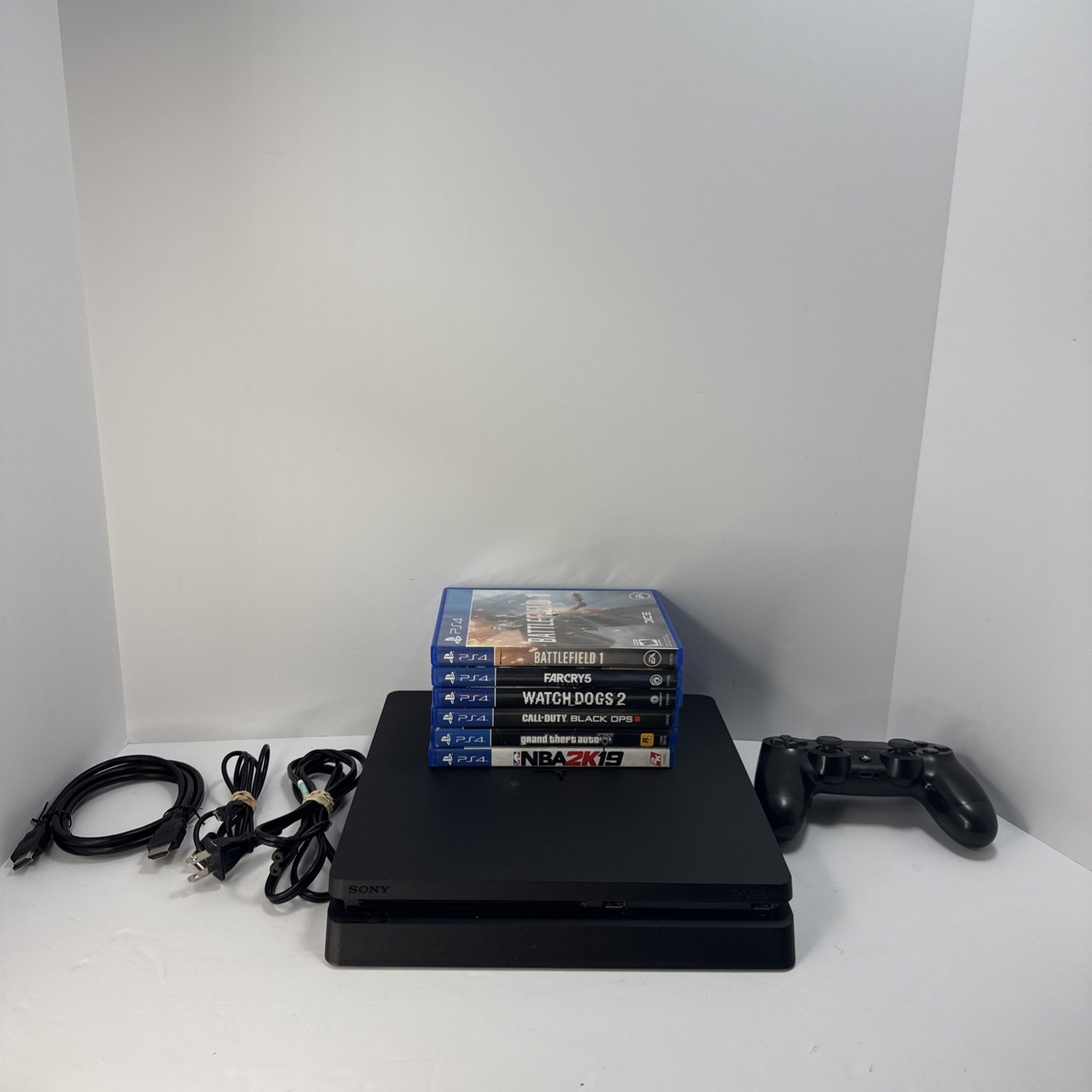 Sony PlayStation 4 PS4 Slim 500GB + Controller, Games Bundle – Restored