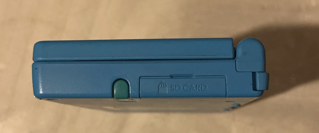 Nintendo DSi Electric Blue Handheld Gaming Console TWL-001 with Stylus Tested