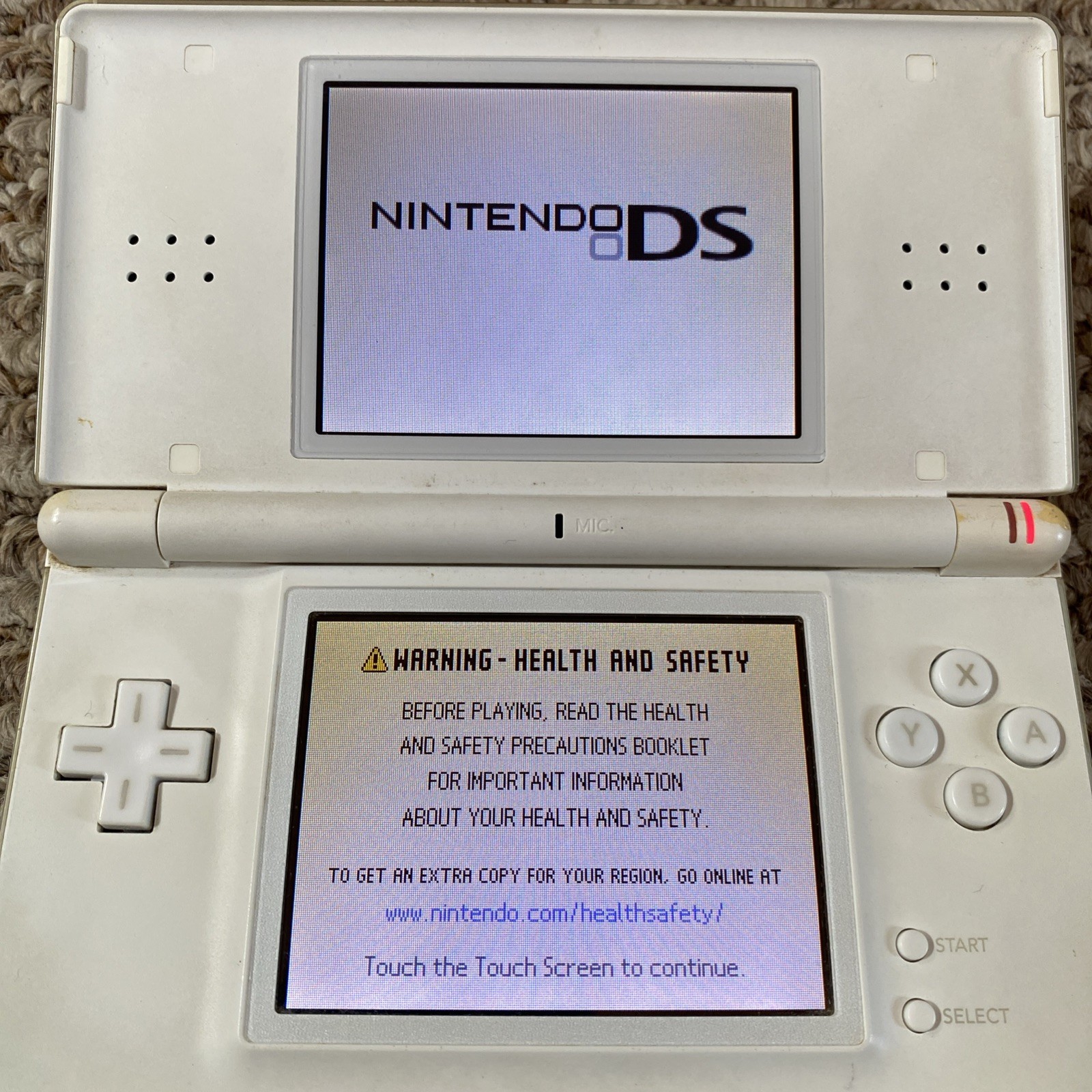 Nintendo DS Lite (USG-001) Handheld – White Charger