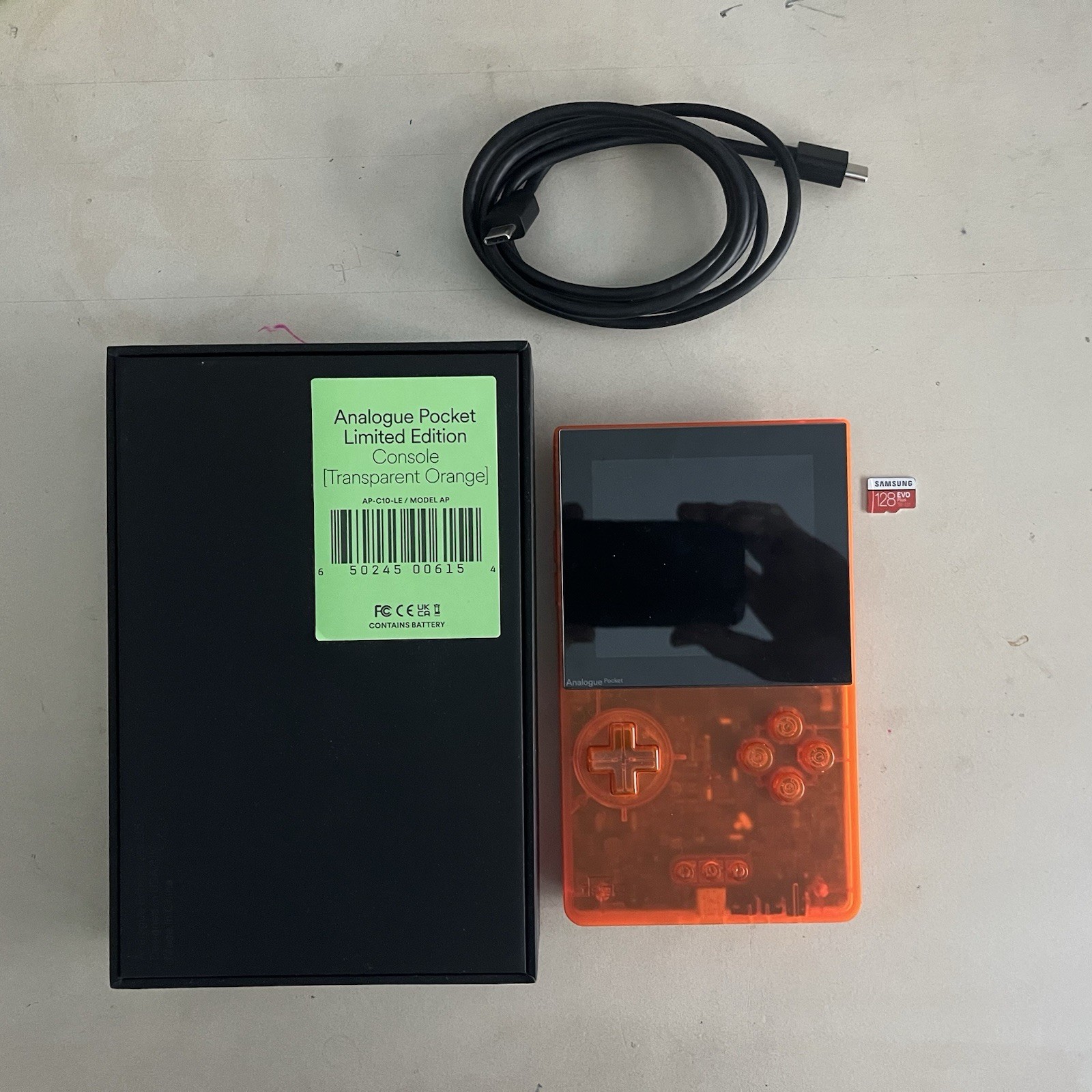 Analogue Pocket Transparent Orange Handheld System W/ 128gb SD Card (Scratched)