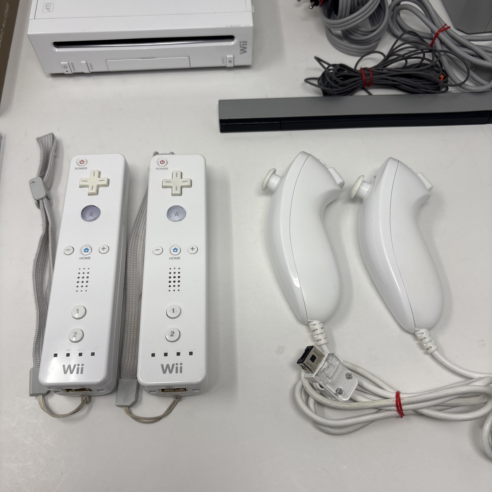 Nintendo Wii Console Bundle w/ 2 Remotes – 2 Nunchuks – Wii Sports – Mario
