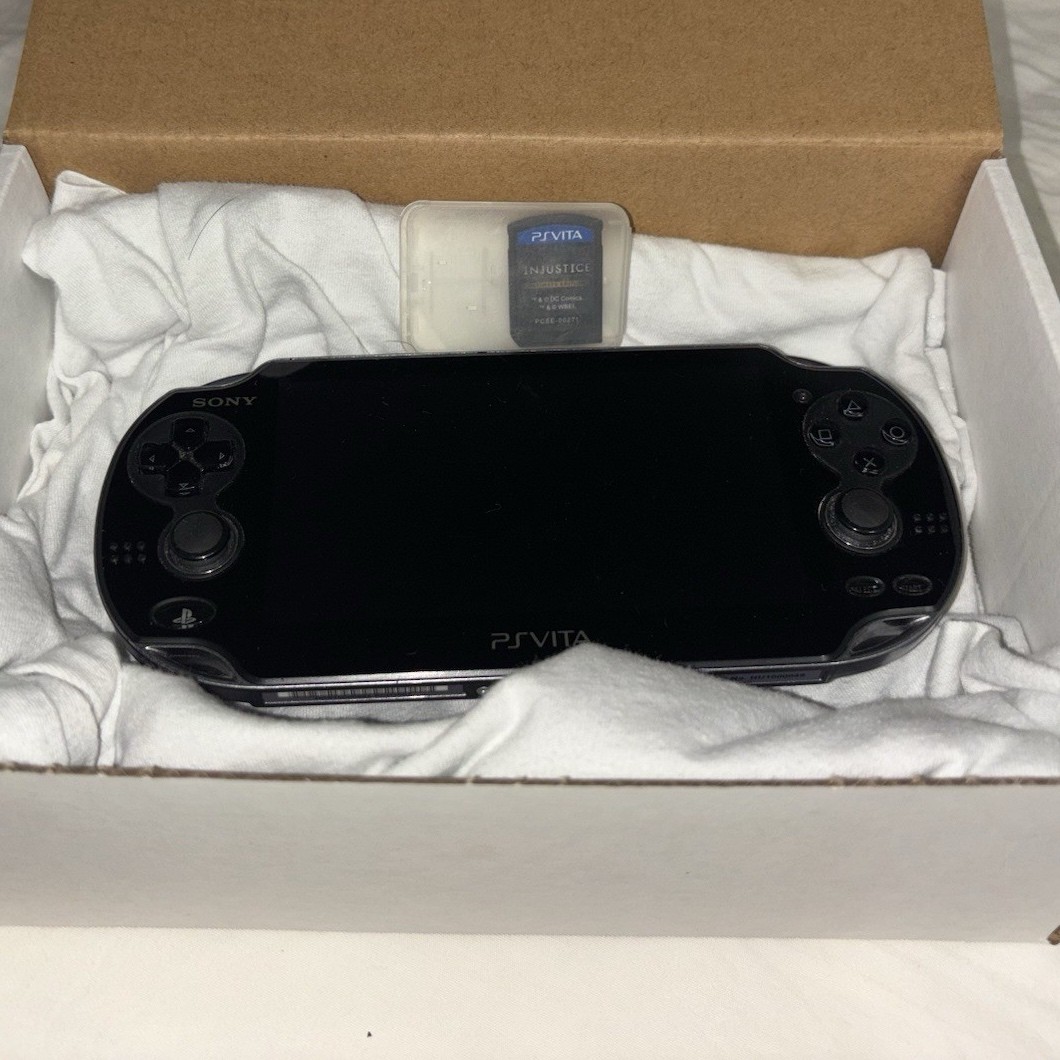 Sony PS Vita PCH-1001 Black Wi-Fi Handheld + Injustice Ultimate Edition Game