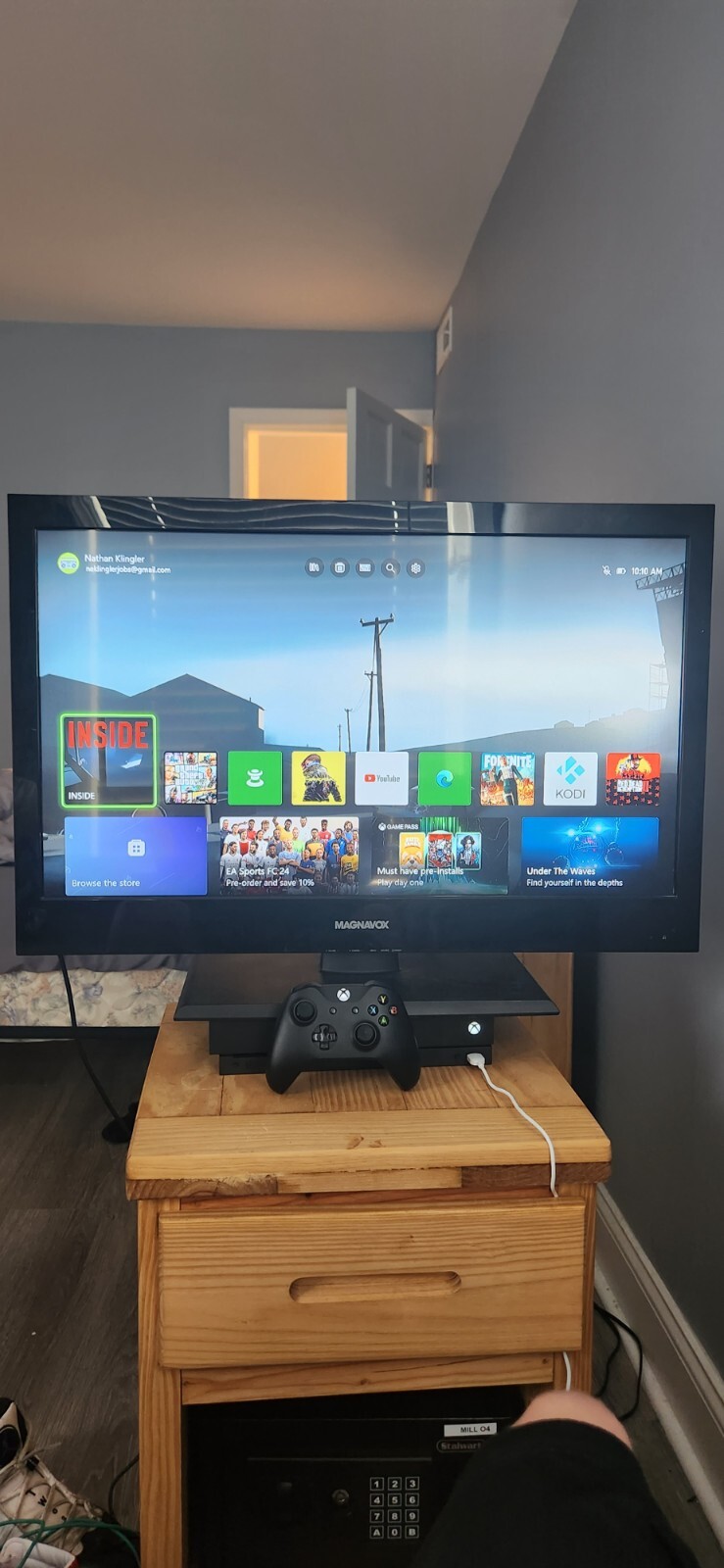 Xbox One X 1 TB console with all cables, controller, and Magnavox TV