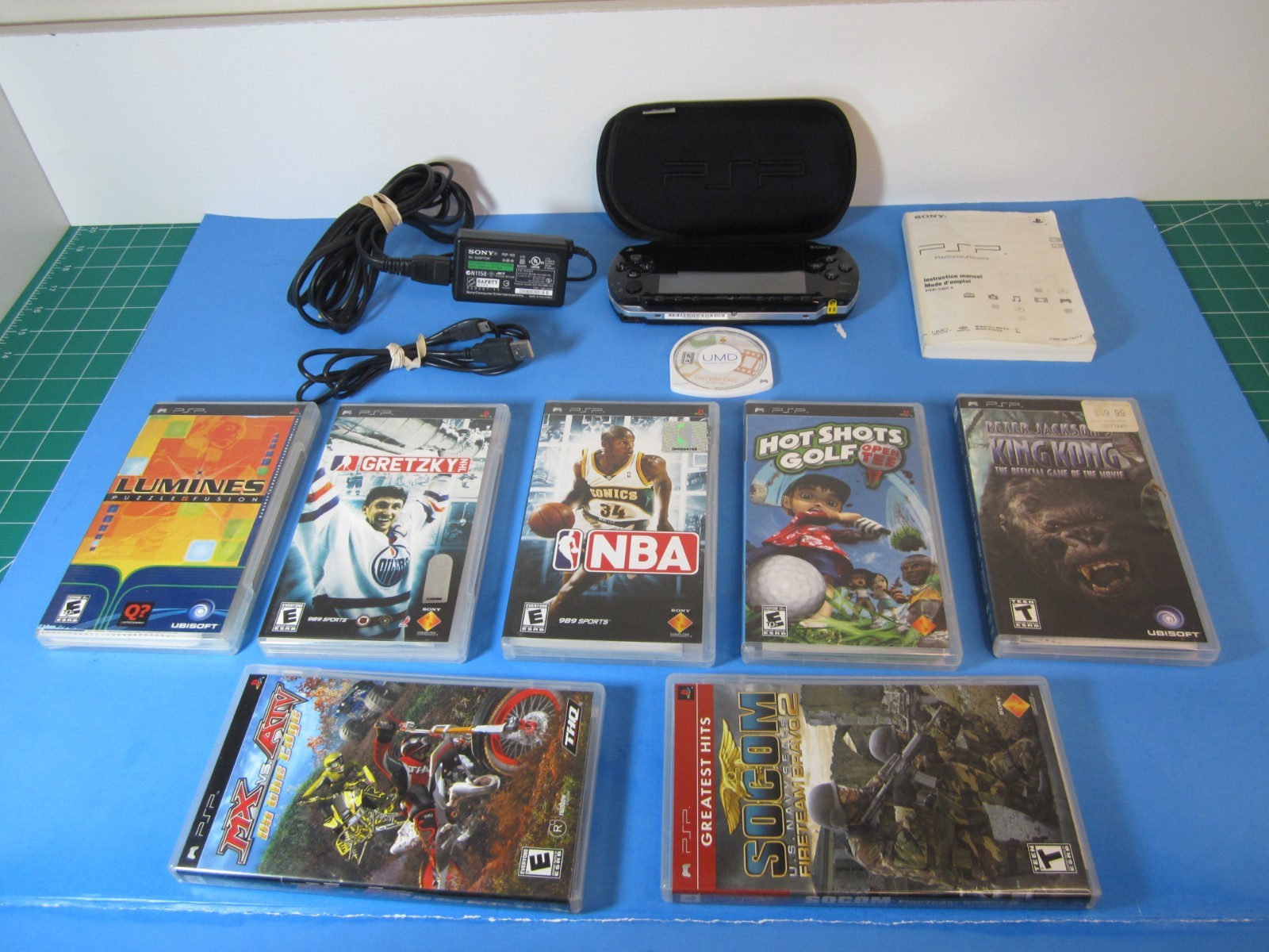 SONY PSP-1001 Black Console Bundle 7-Games with manuals & accessories *TESTED*