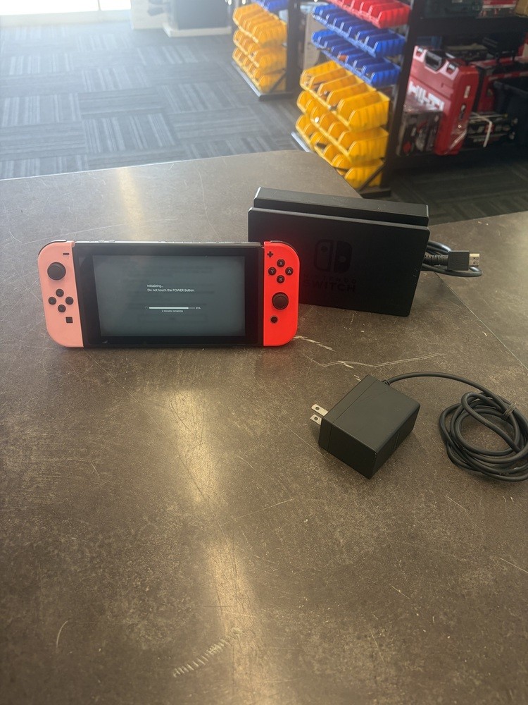 NINTENDO SWITCH W/ CORAL & NEON RED JOY CONS HAC-001- (-01)