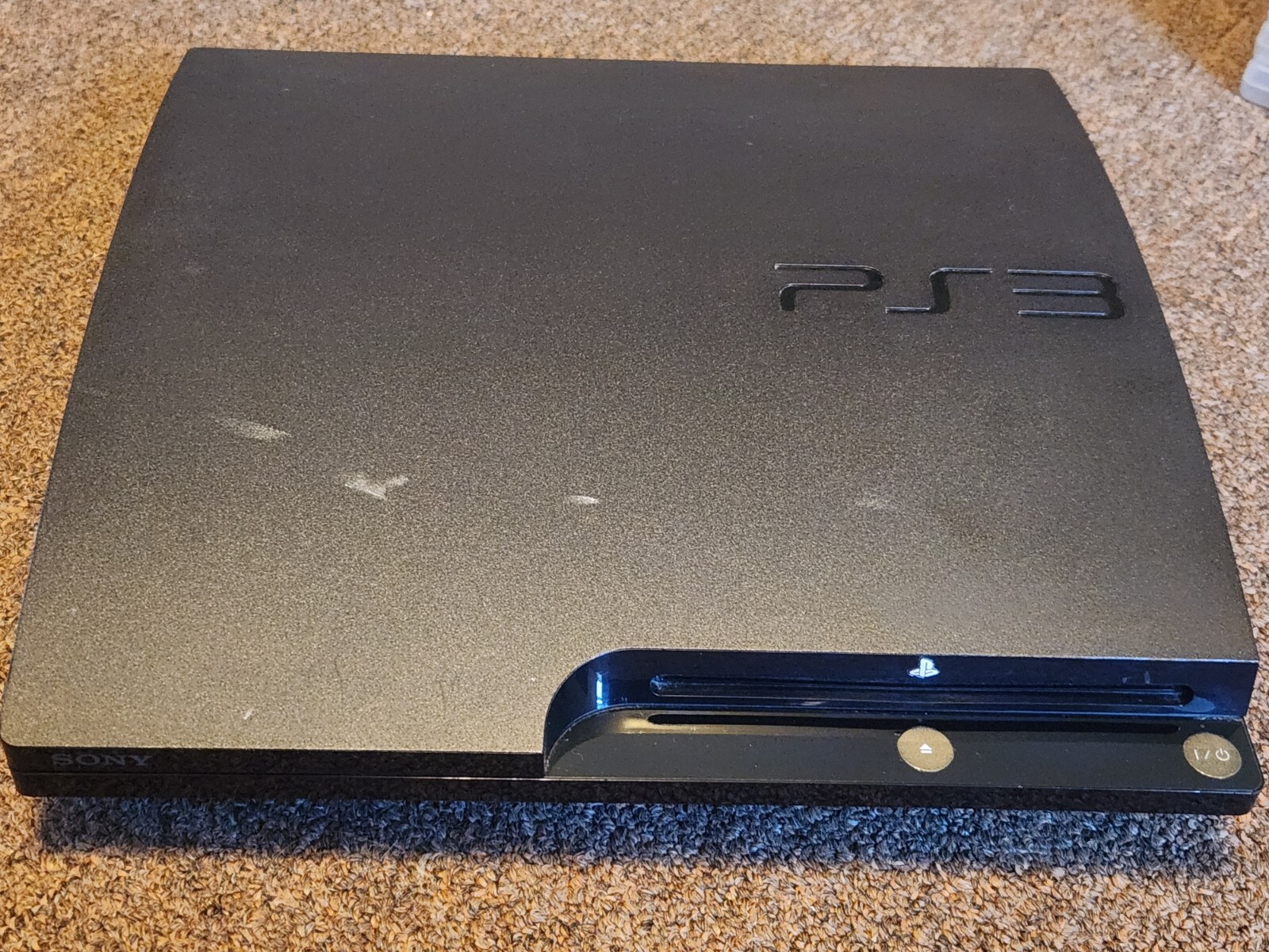 Sony PS3 (CECH-2001A) Bundle (12 games, 2 controllers, 1 Padded Travel Bag)