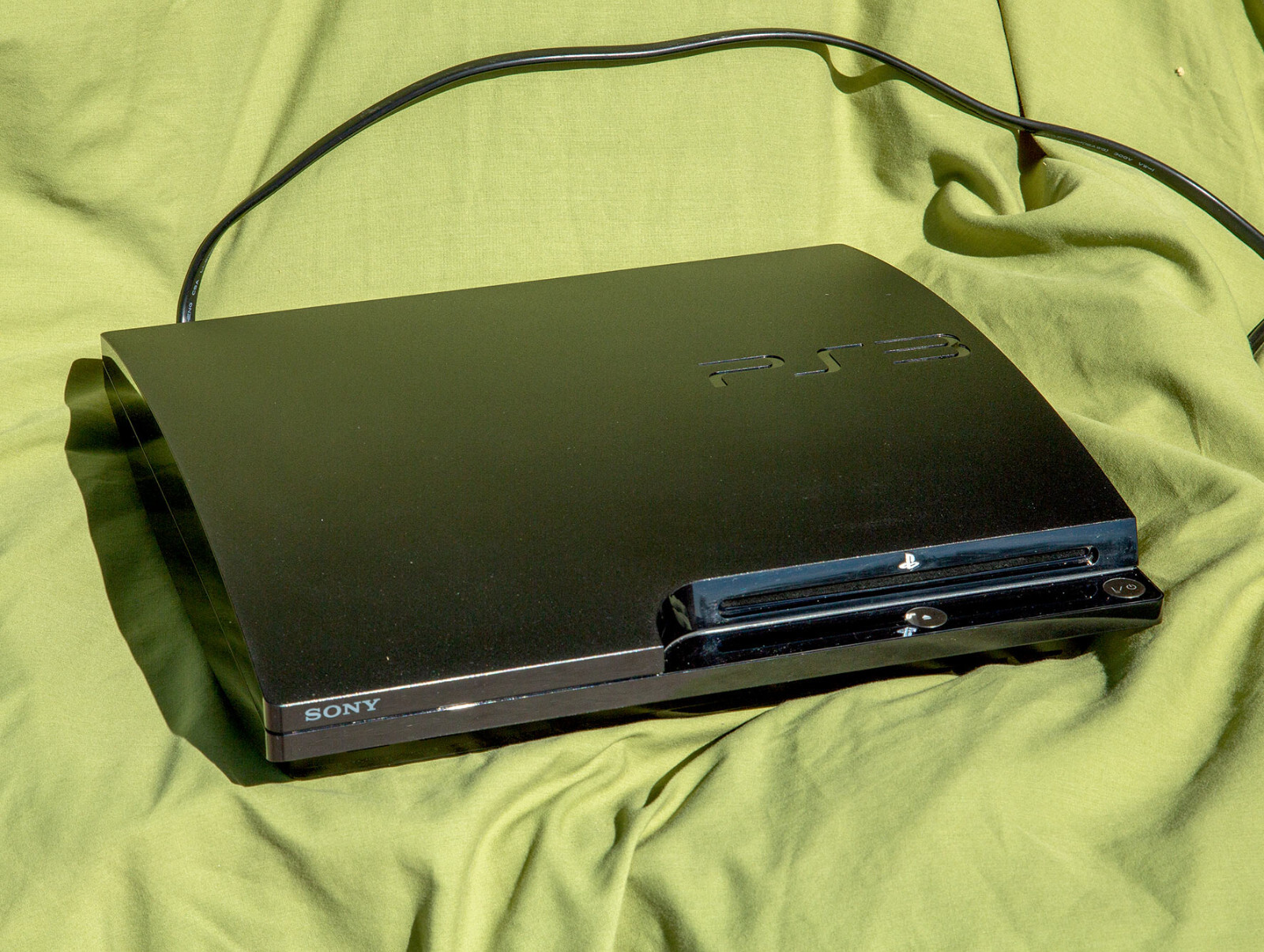 Sony Play Station 3 plus 13 games and other items as shown.