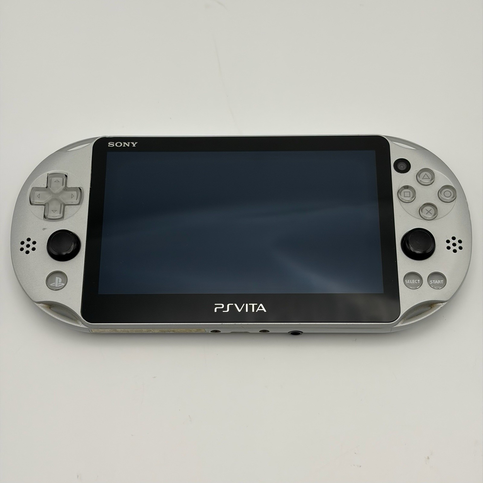 SONY PS Vita PCH-2000 Console Silver Very Good Fast Shipping No joystick drift.