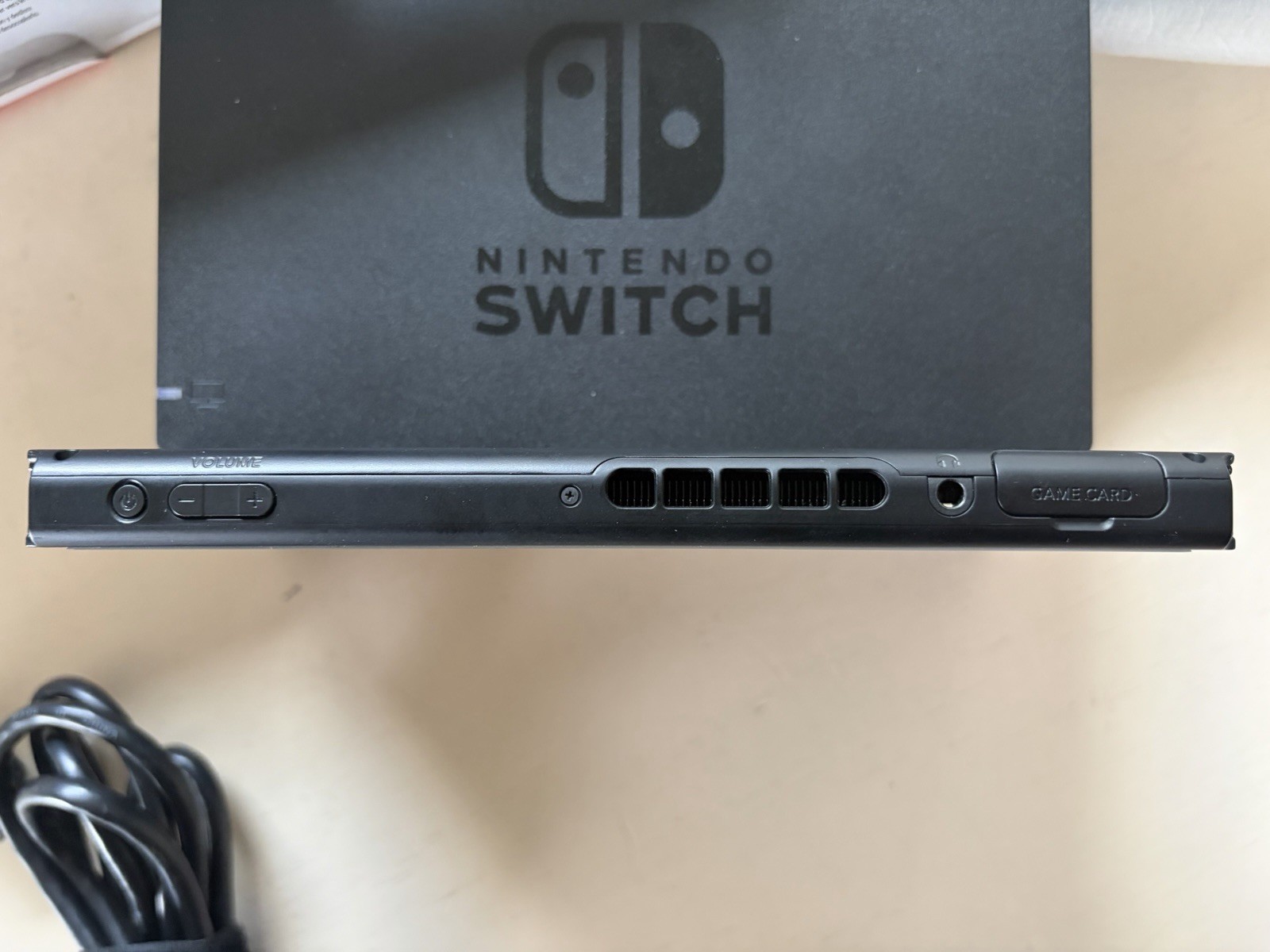 Nintendo Switch version 2, opened box, HAC-001(-01) handheld console, red/blue.