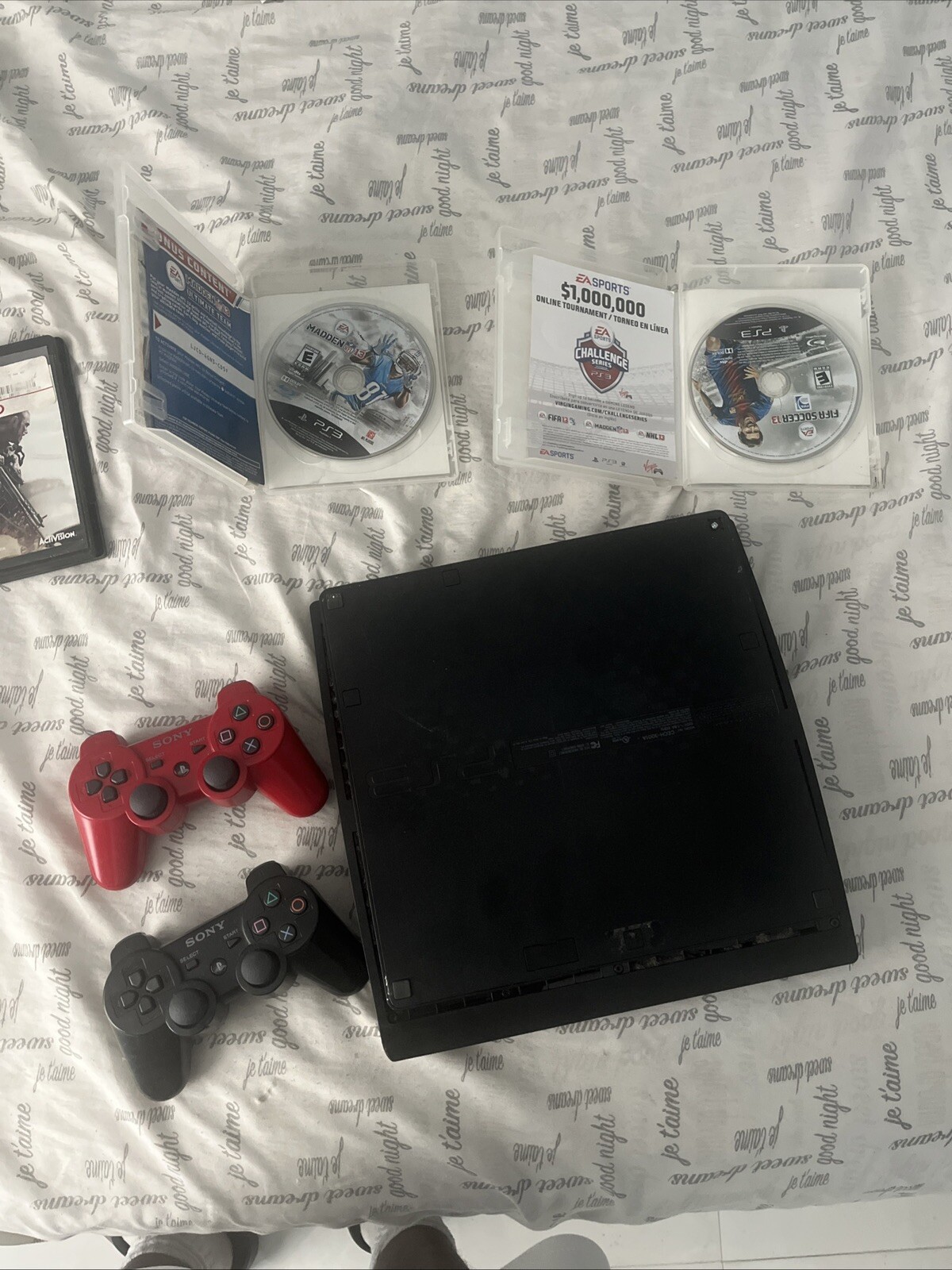 Sony PlayStation 3 Slim Uncharted 3 160GB Charcoal Black Console with games