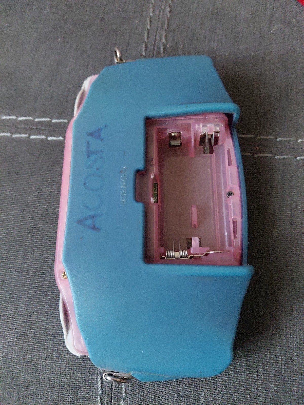 Nintendo Game Boy Advance 32MB Handheld System – Fuchsia Pink no tapa de bateria