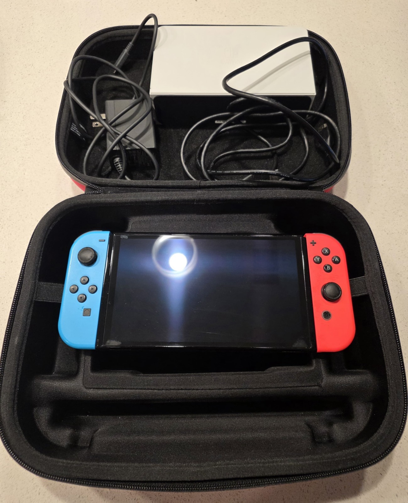 Nintendo Switch Console OLED, Blue and Red Joy-Con, Dock, Charger, Carrying Case