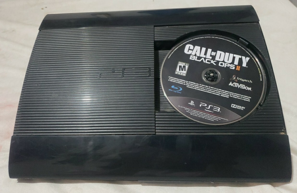 Sony PlayStation 3 game system – Black *COD: Black Ops 2 included inside*