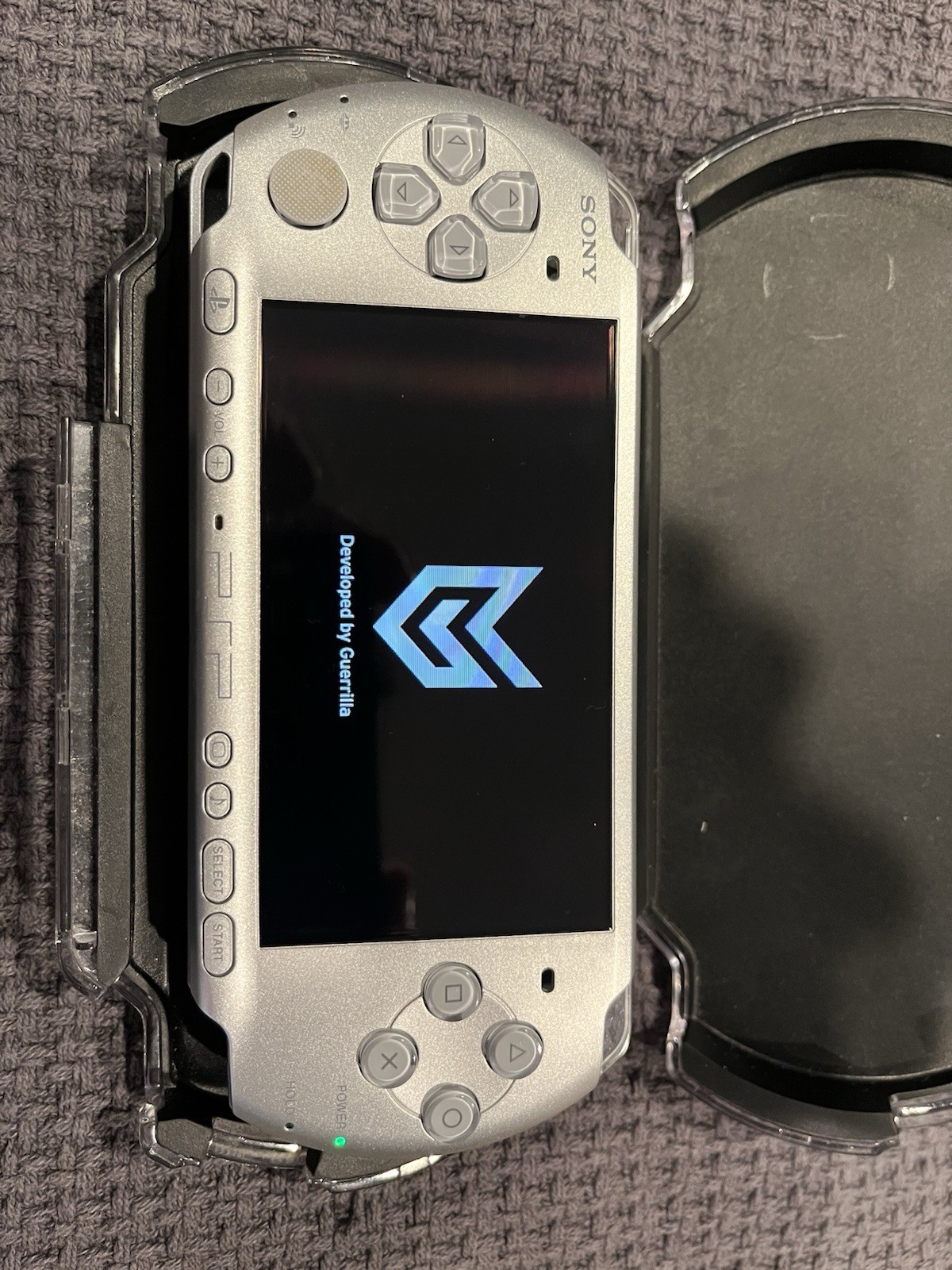 Sony PSP 3000 Slim Silver Huge Bundle W/games, Movies , Hard Case & more