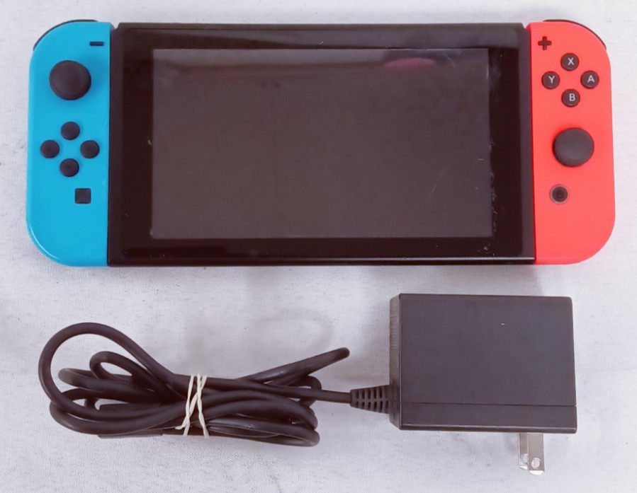 Nintendo Switch HAC-001 Console 32GB Handheld w/ Red & Blue Detachable Joy-Con