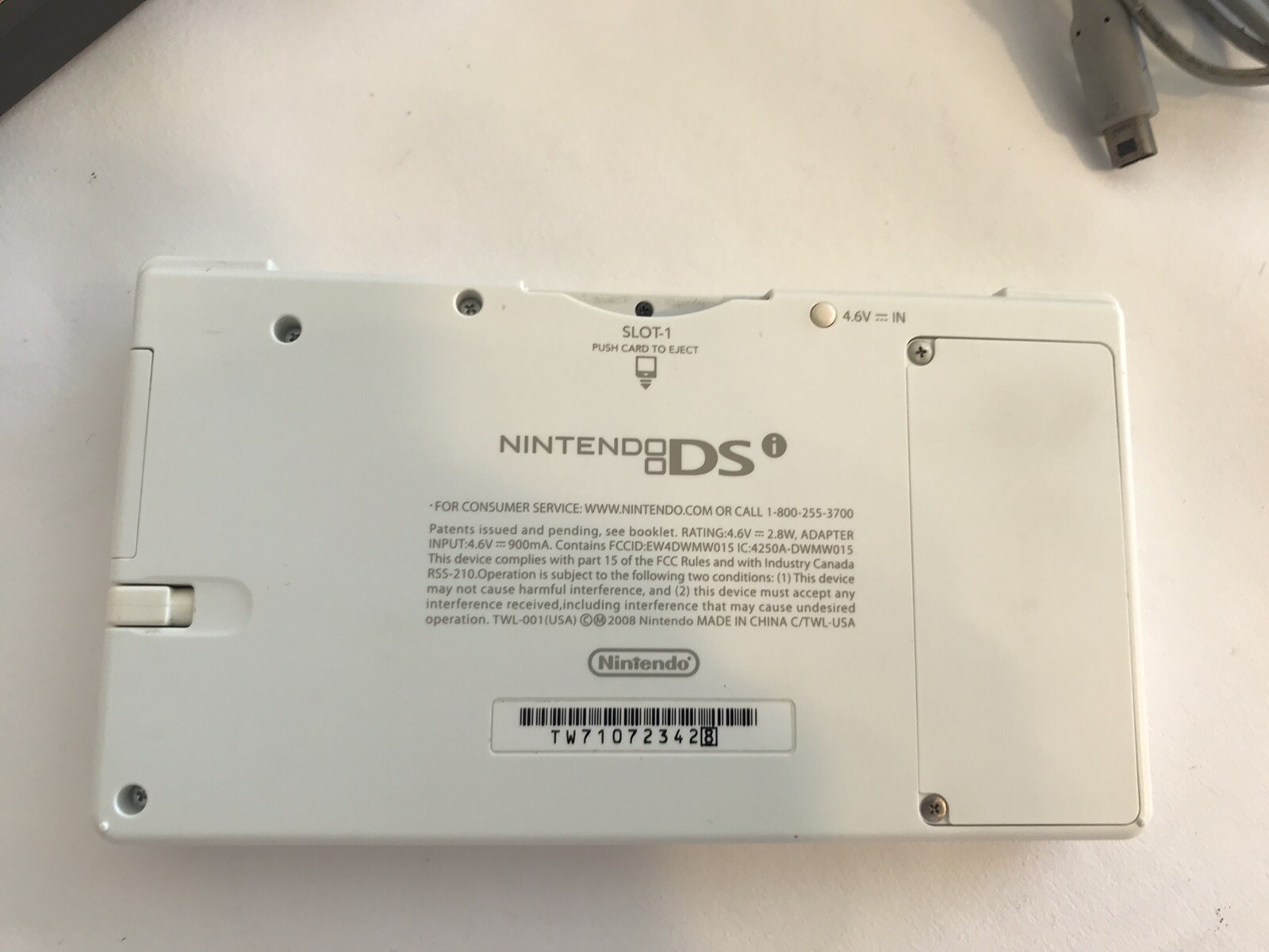 Nintendo DSi Handheld Game Console – White- with charger and 8 games