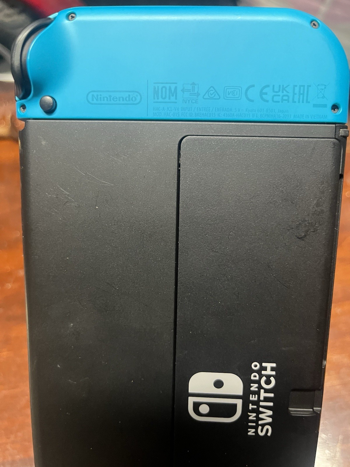 Nintendo Switch – OLED Model w/ Neon Red & Neon Blue Joy-Con