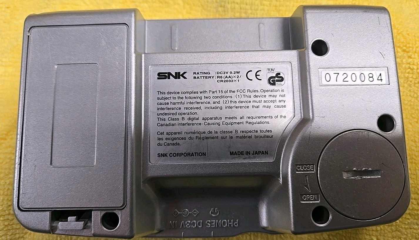SNK Playmore Neo Geo Pocket Launch Edition Platinum Silver Handheld System.