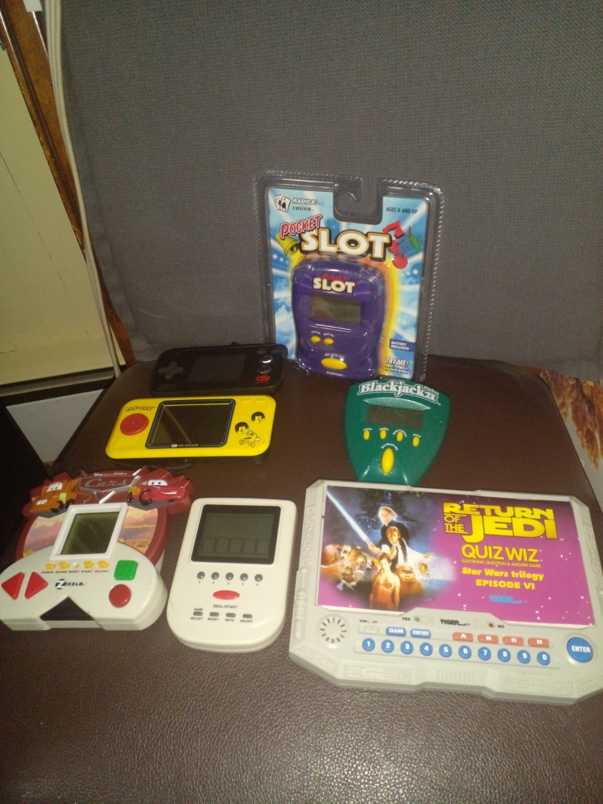 Lot of 7 Pac-man Starwars Pixar Cars Game V Portable Slots Electronic Handheld.