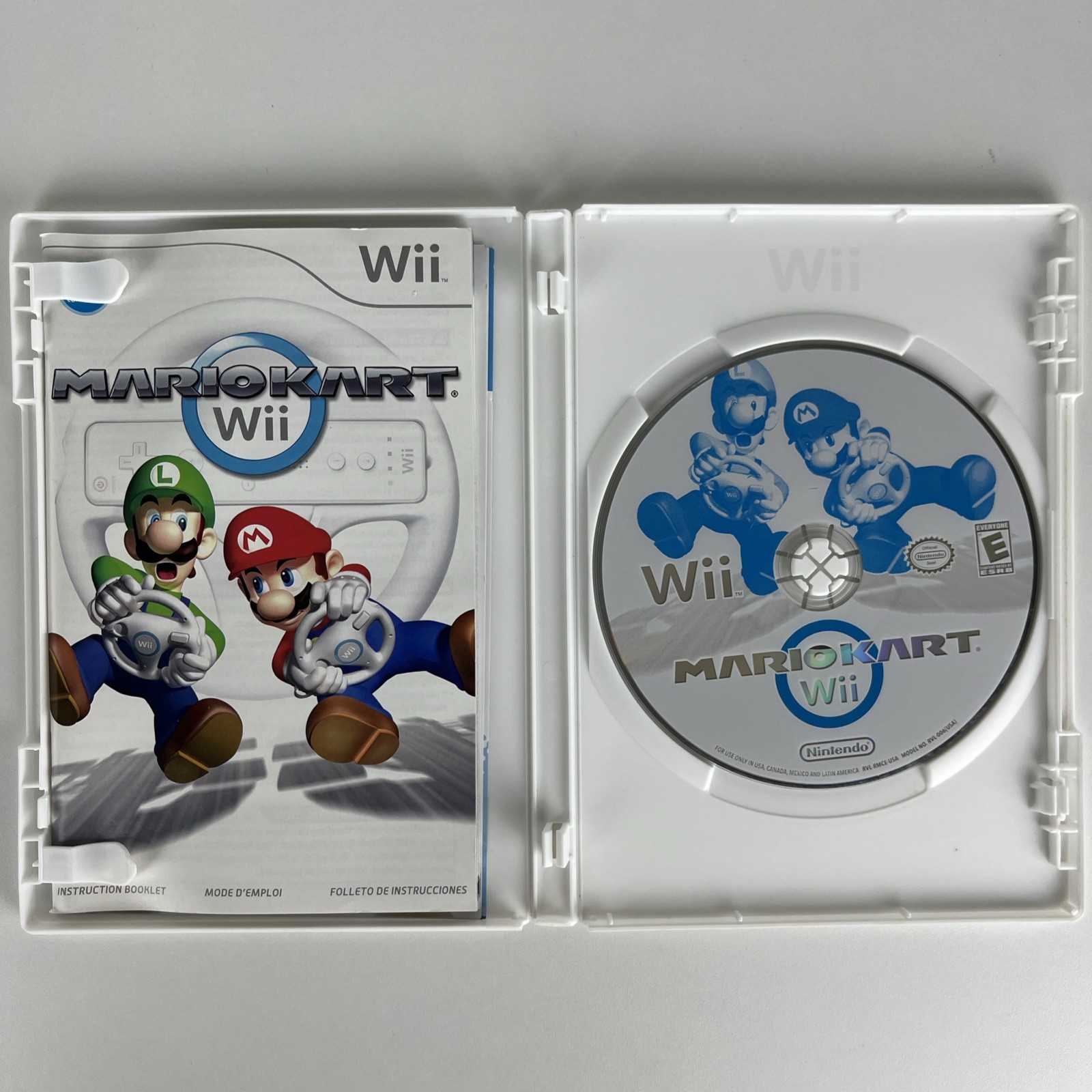 Nintendo Wii Console Bundle: Controller, Wheel + 6 Games Mario Kart, Monster Jam