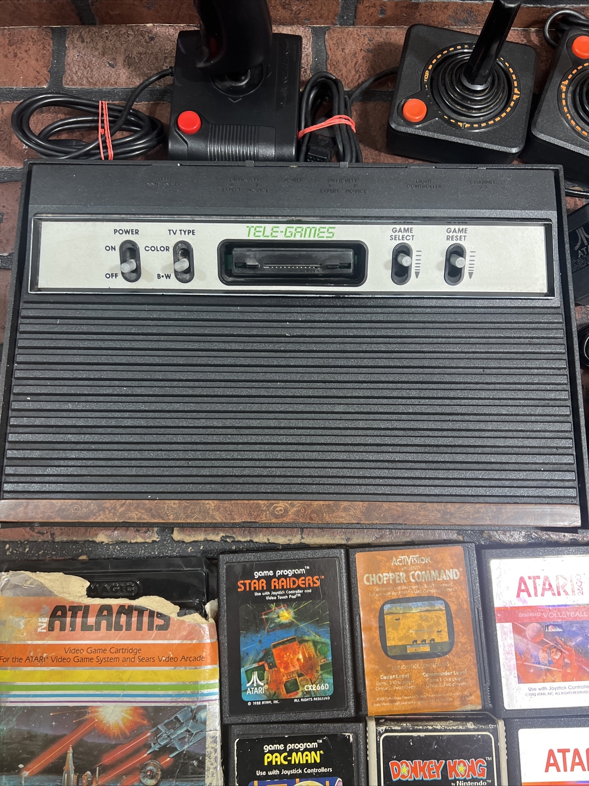 ATARI 2600 4-Switch w/ Power Supply, Joysticks, Paddles, TV Adapter & 7 Games