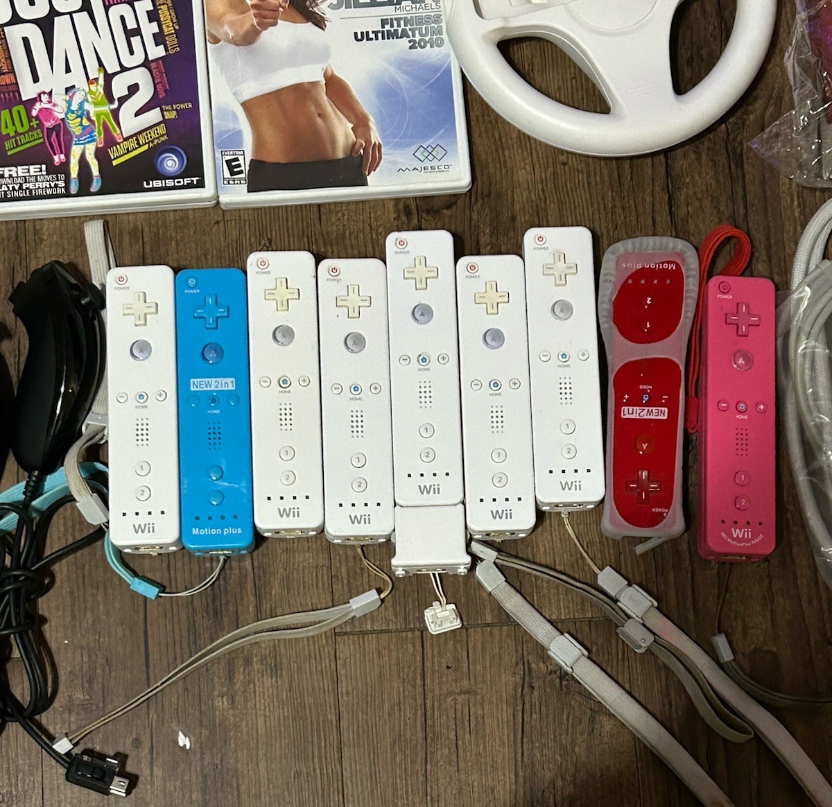 Huge Nintendo Wii Accessory Bundle,Remotes, MotionPlus,Wheels, Sports Pack,Games
