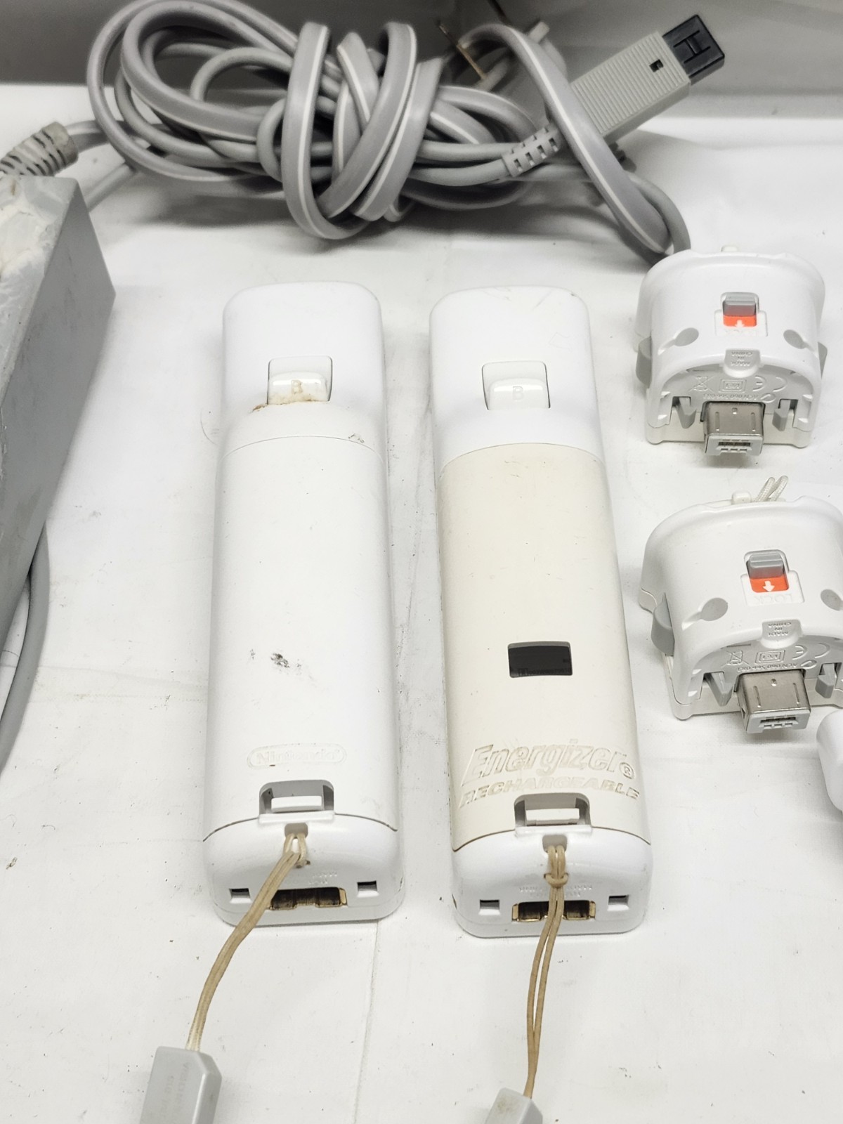 Nintendo Wii Console Bundle (2) Controllers, Motion Plus, Game Nunchuck, & Cords