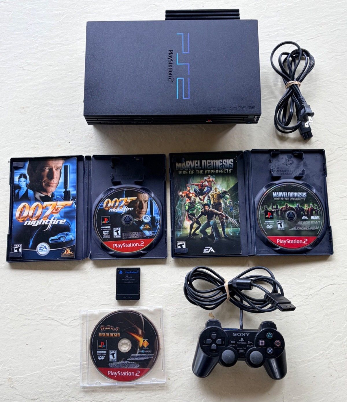 PlayStation 2 Bundle with Games, Controller, Power Cable, and Memory Card/TESTED