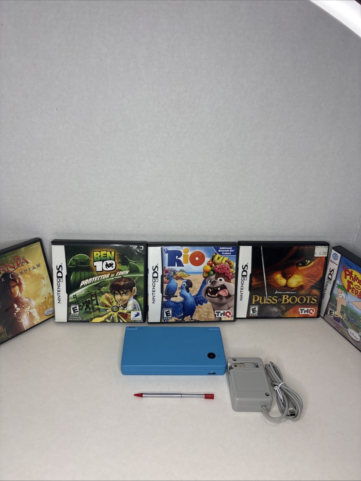 Nintendo DS Handheld System Blue with Aftermarket Charger, Stylus, And Game Lot!