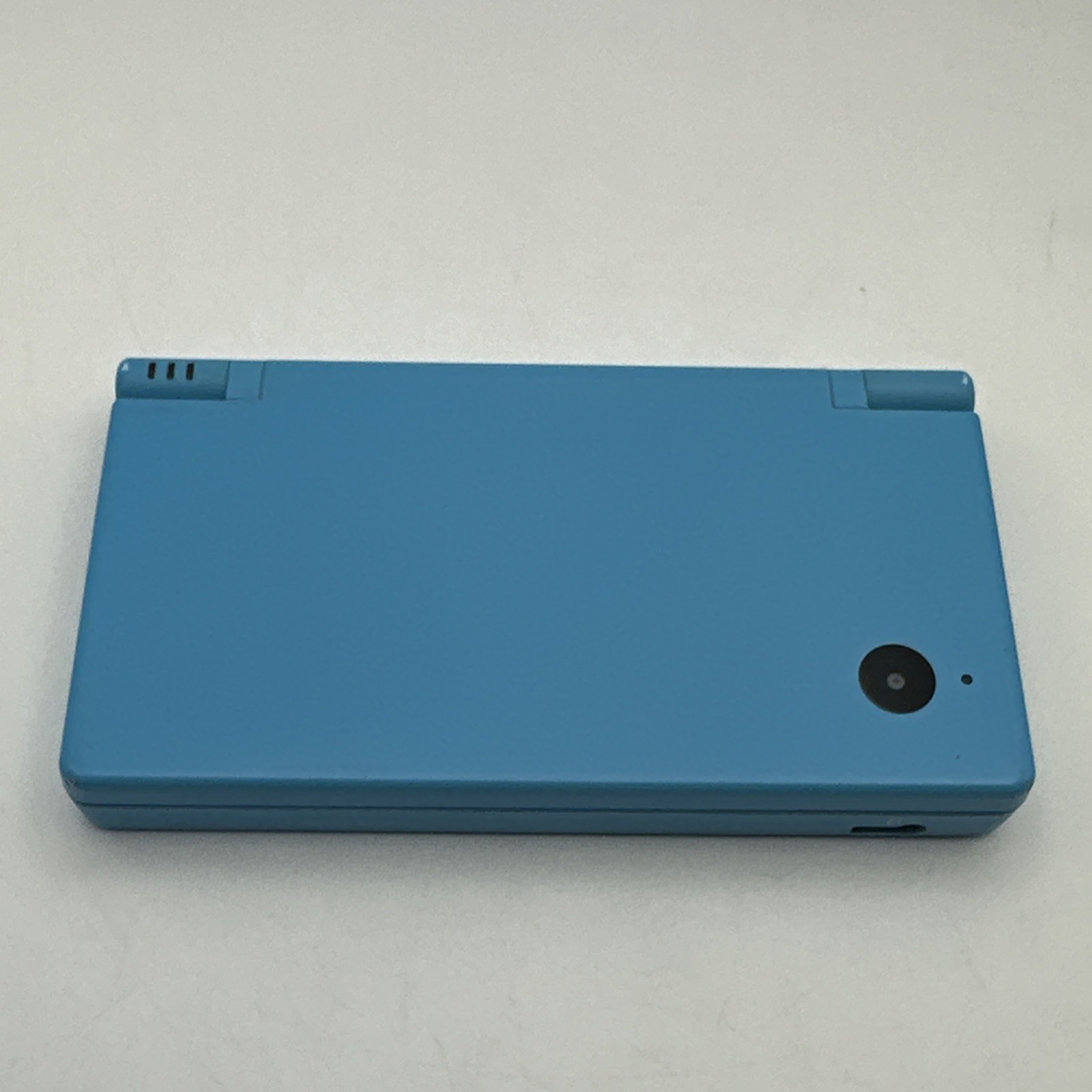 Nintendo DSi Blue Handheld Console C/TWL-USA-1 w/ 4 Games Case Stylus & Charger