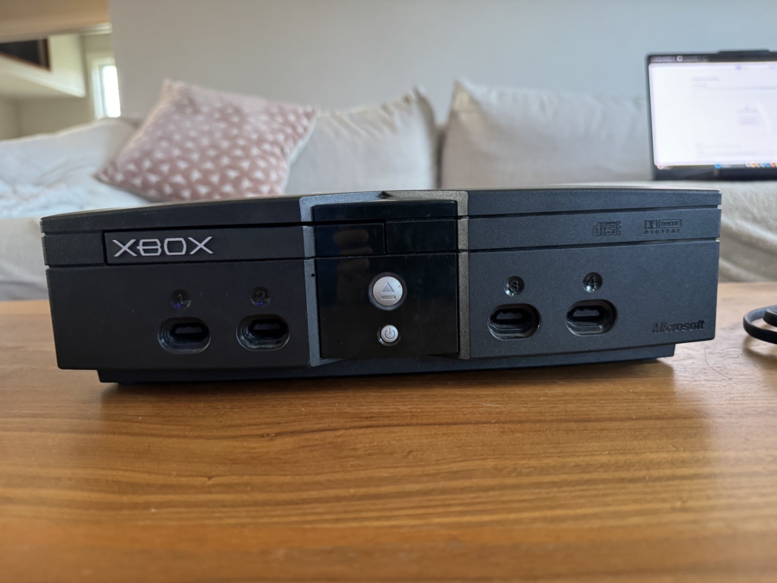 black xbox original consol works connects to tv controllers works fine and cords