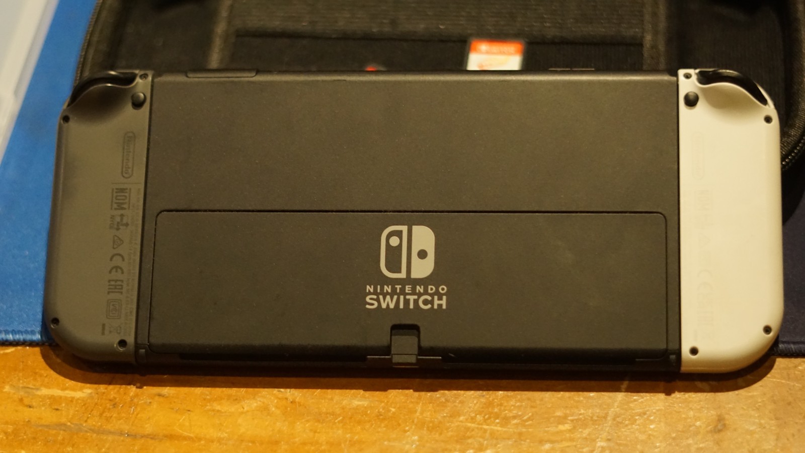 Nintendo Switch OLED Console with Case and 2 Games