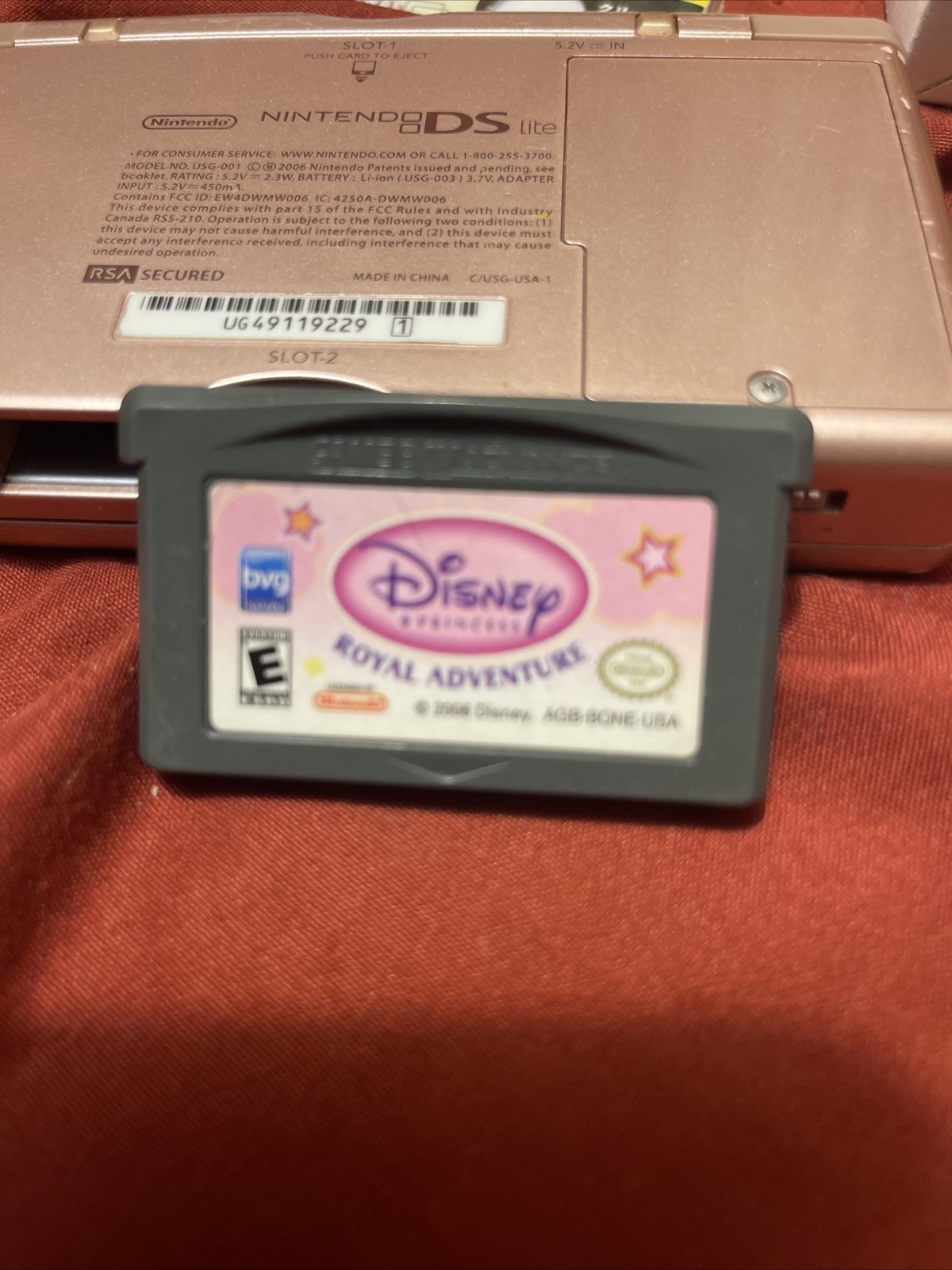 Nintendo DS Lite with AC Charger USG-001- Metallic Rose – GOOD CONDITION