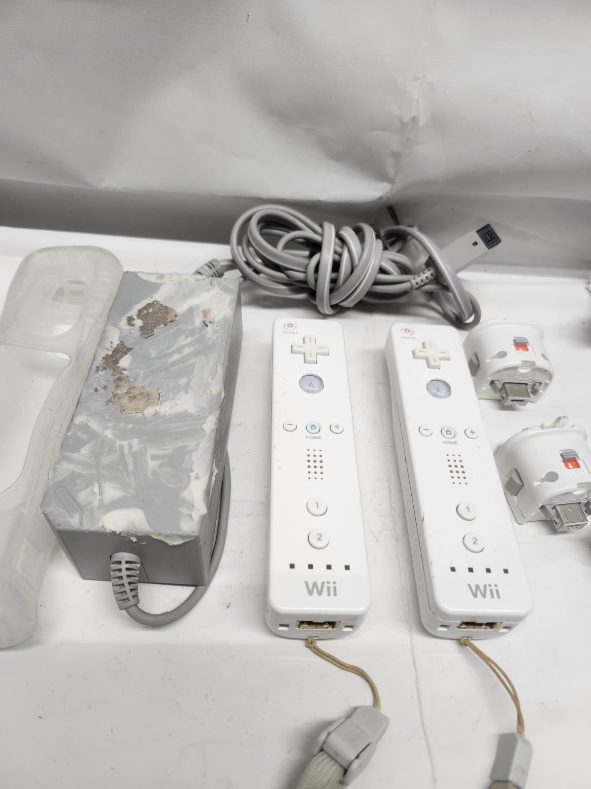 Nintendo Wii Console Bundle (2) Controllers, Motion Plus, Game Nunchuck, & Cords