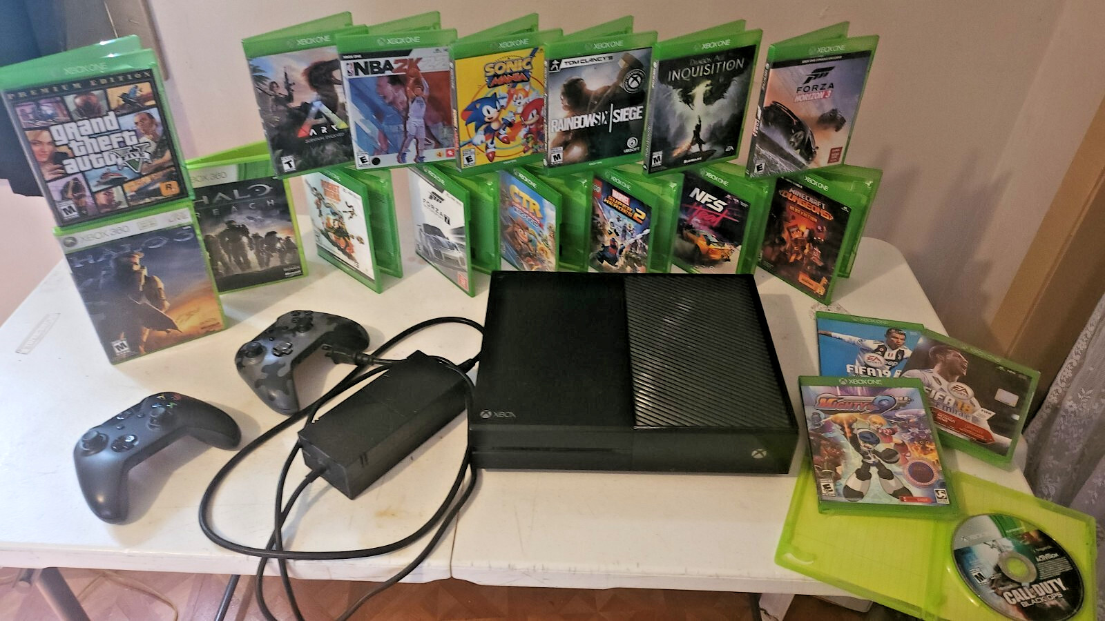 Used Xbox one 780GB console bundle – 19 games – two heavily used controllers