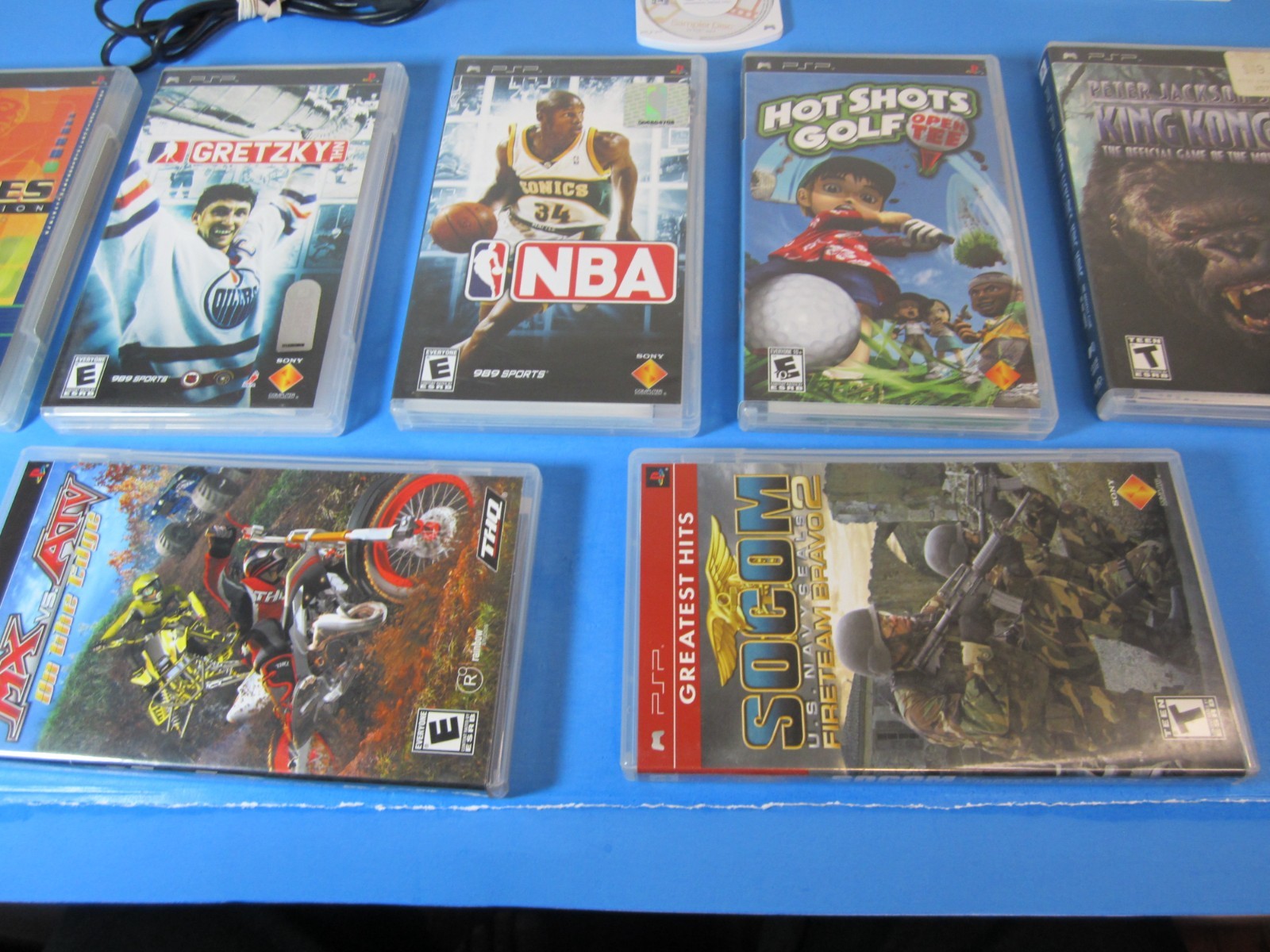 SONY PSP-1001 Black Console Bundle 7-Games with manuals & accessories *TESTED*