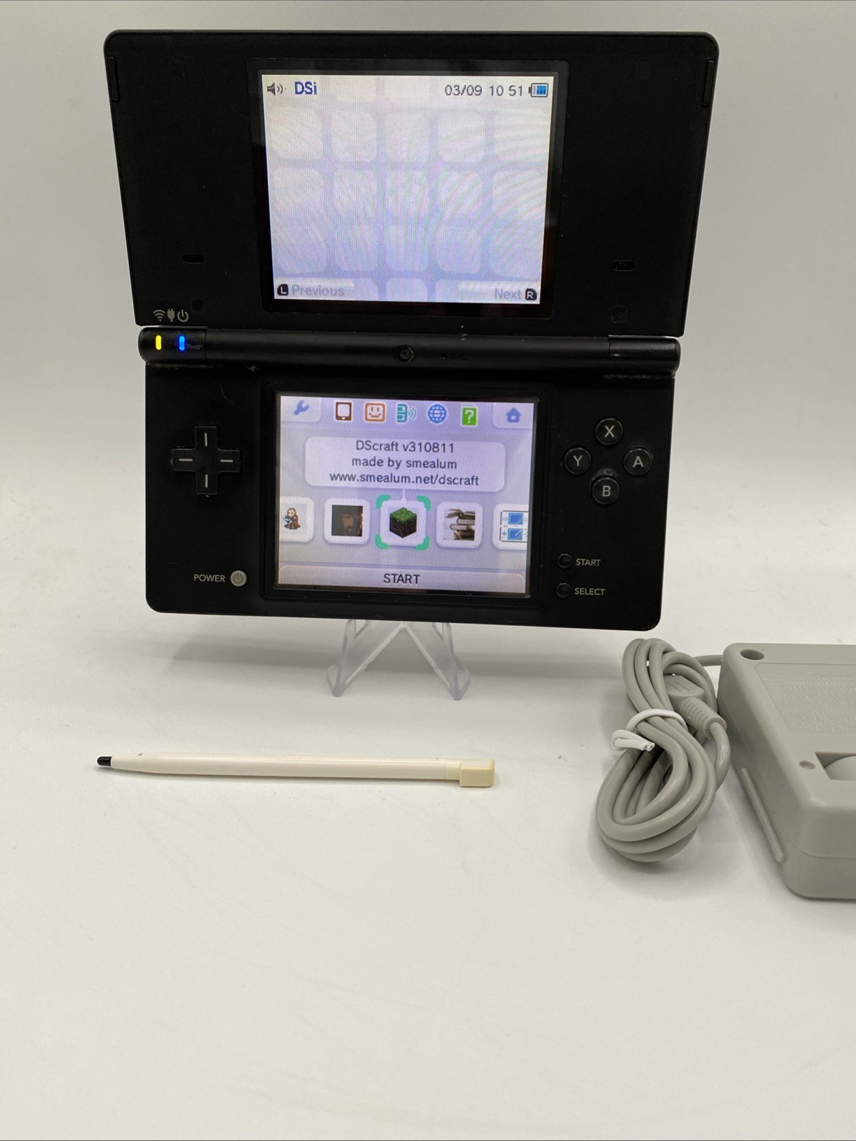 Nintendo DSi Black – Includes Preloaded Library (Large Collection)
