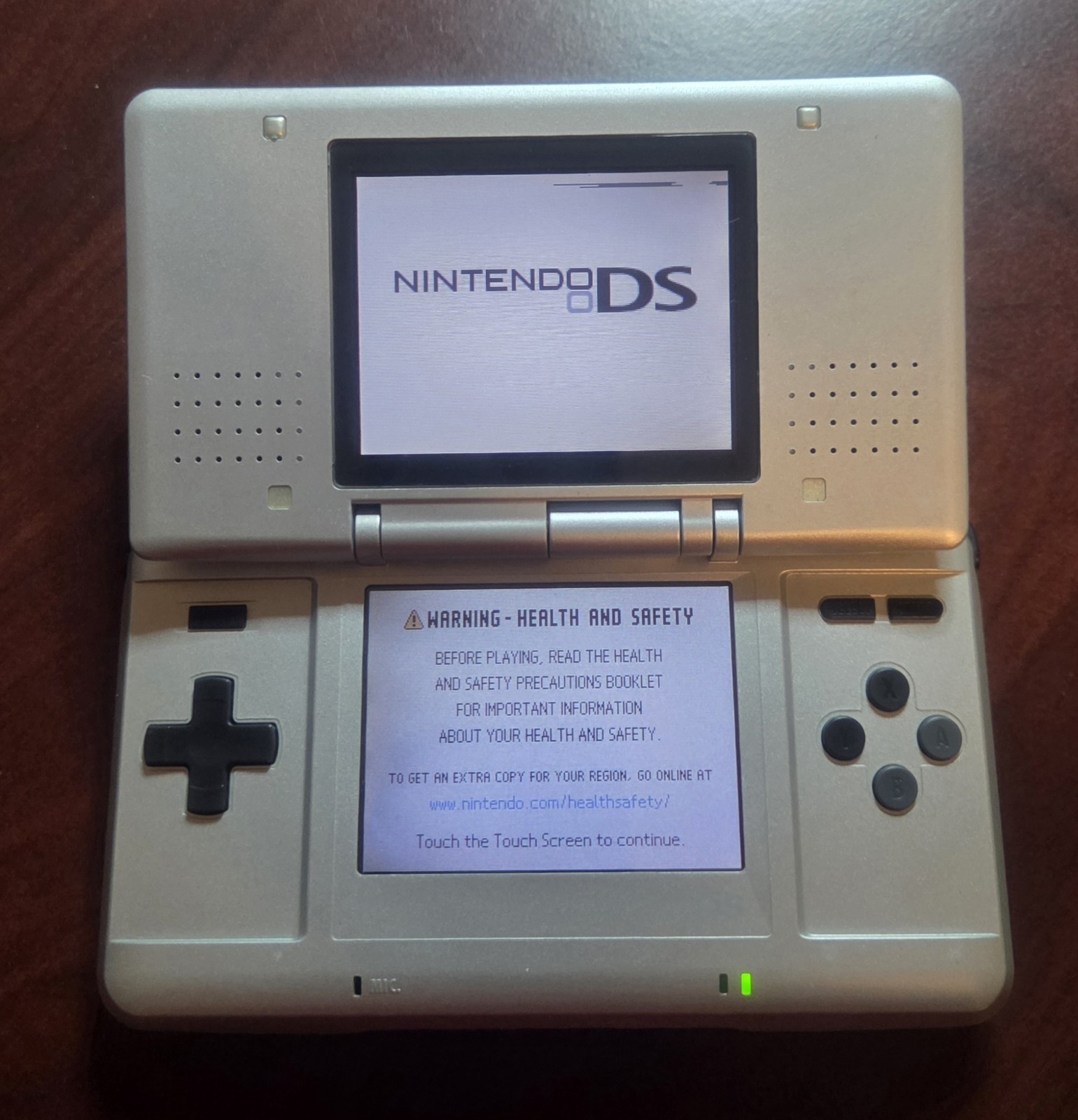 Nintendo DS NTR-001 Silver Handheld System with Touch Screen, Headphone Jack