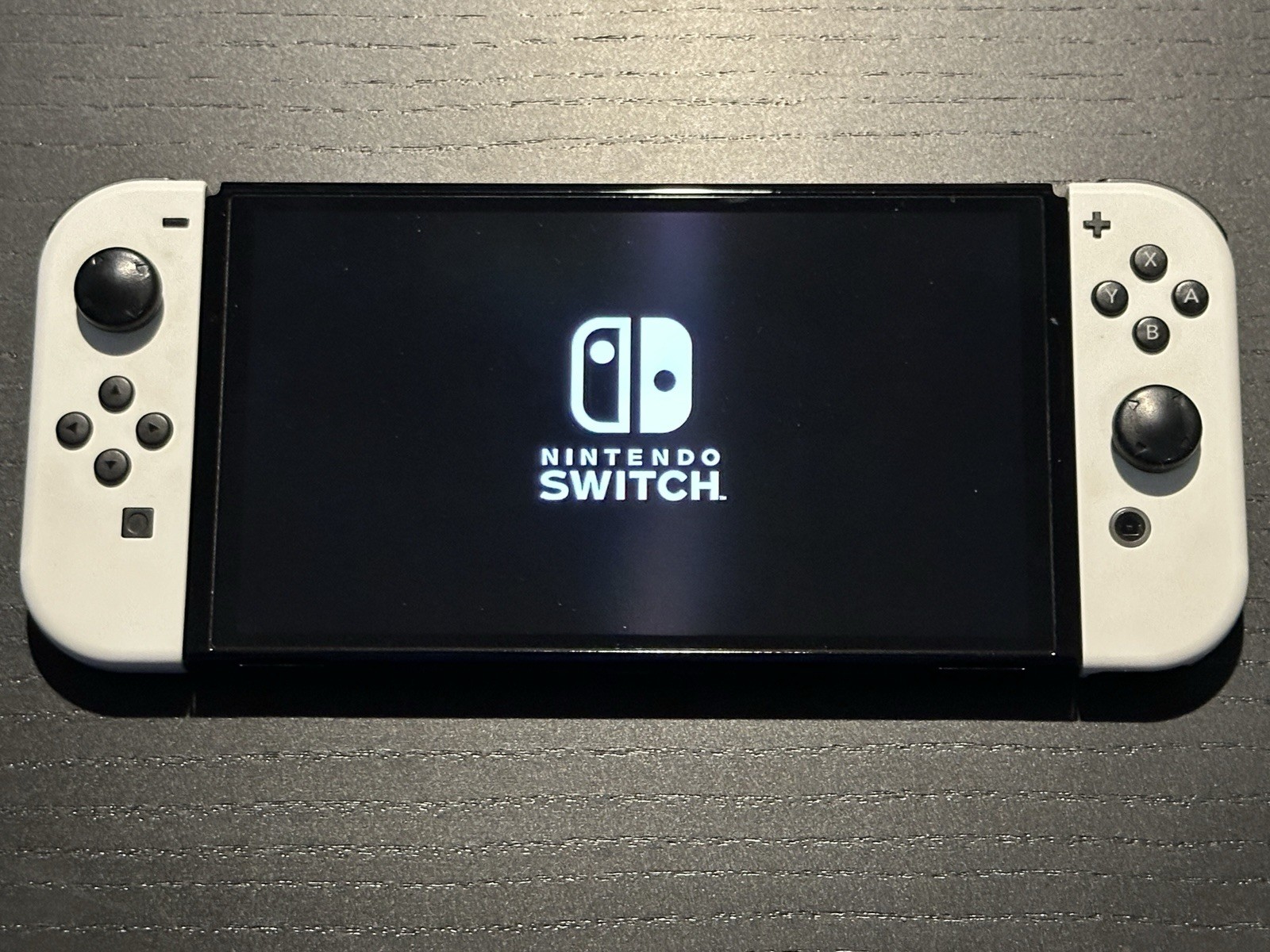 Nintendo Switch White OLED Bundle – Game, Carrying Case, 128GB SD Card & More