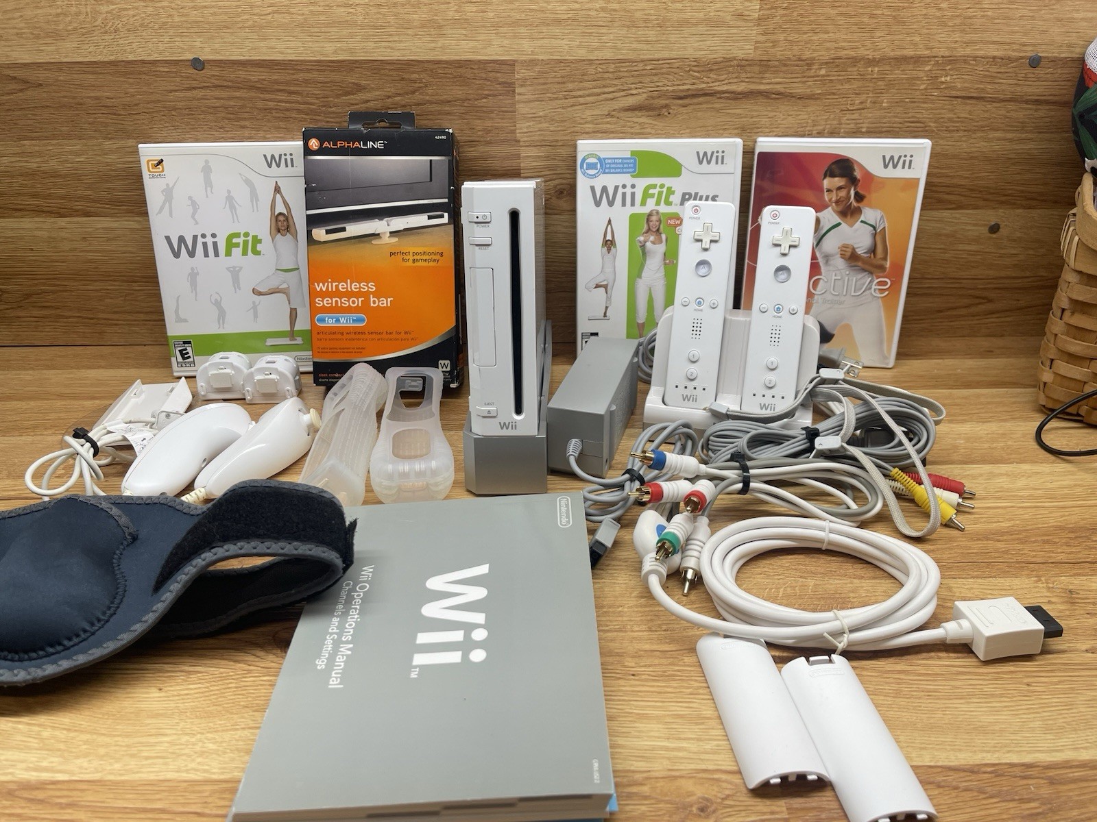 Nintendo Wii Console, Stand, Cords, 2 Controllers, 2 Nunchucks, Manual, 2 Games
