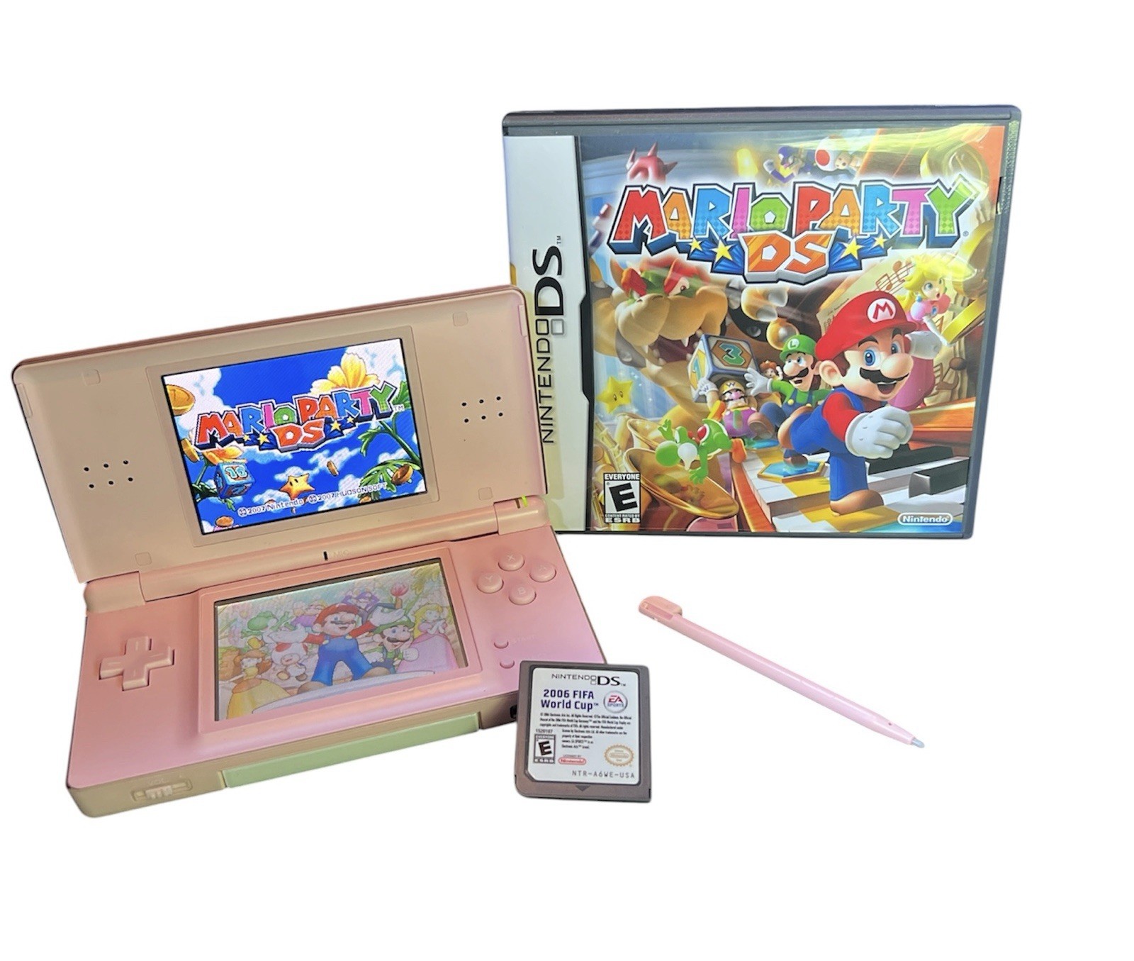 Nintendo DS Lite Console USG-001 Coral Pink w/ Mario Party & FIFA WC 06. Tested.