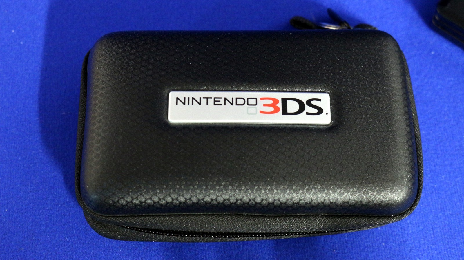 Nintendo 3DS Cosmo Black Console Case, Earbuds, 1 stylus, Charger + 4 Games
