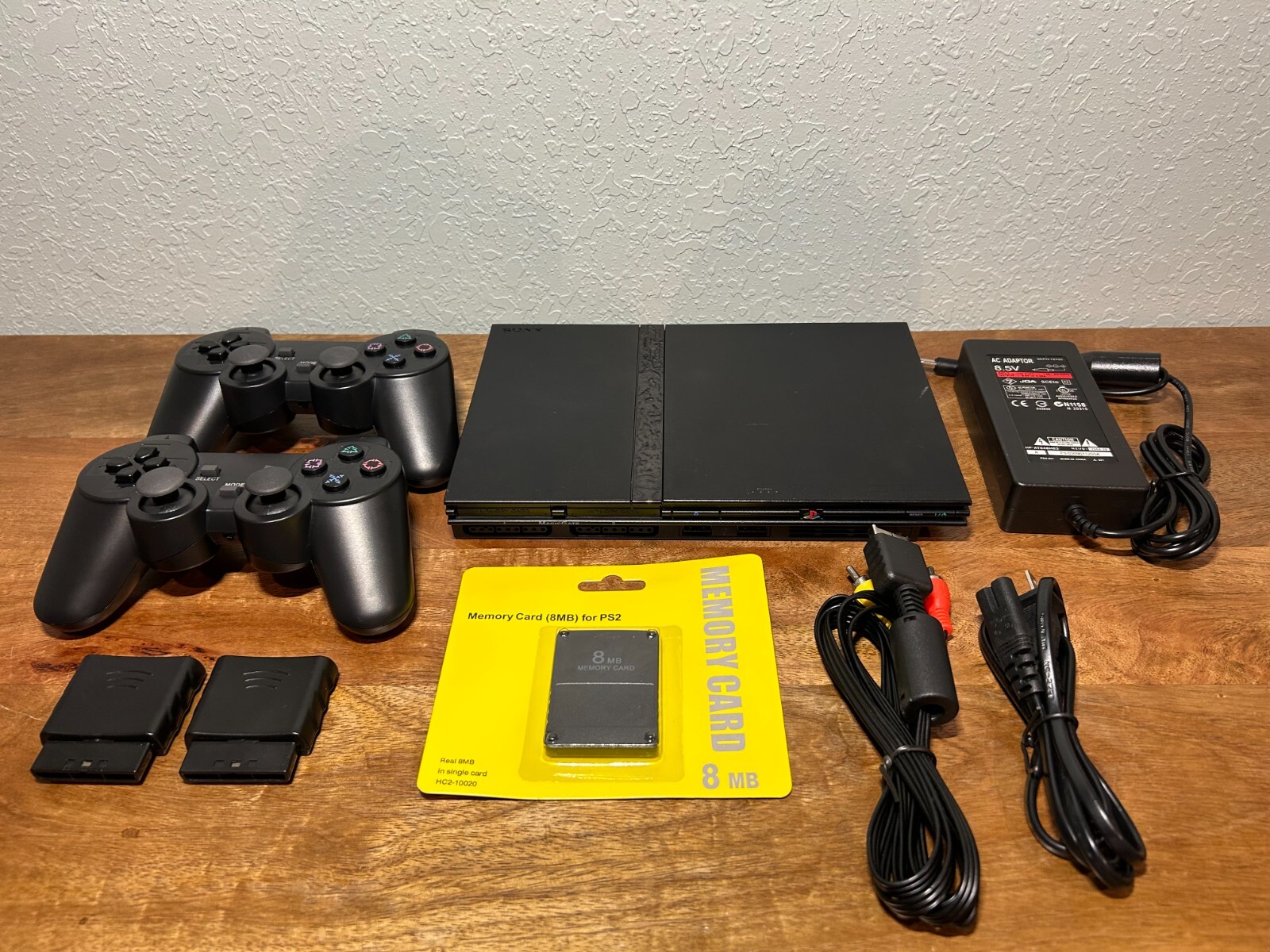 Sony PlayStation 2 Slim Bundle, 2 Controllers and Cords Included (SCPH-70012)