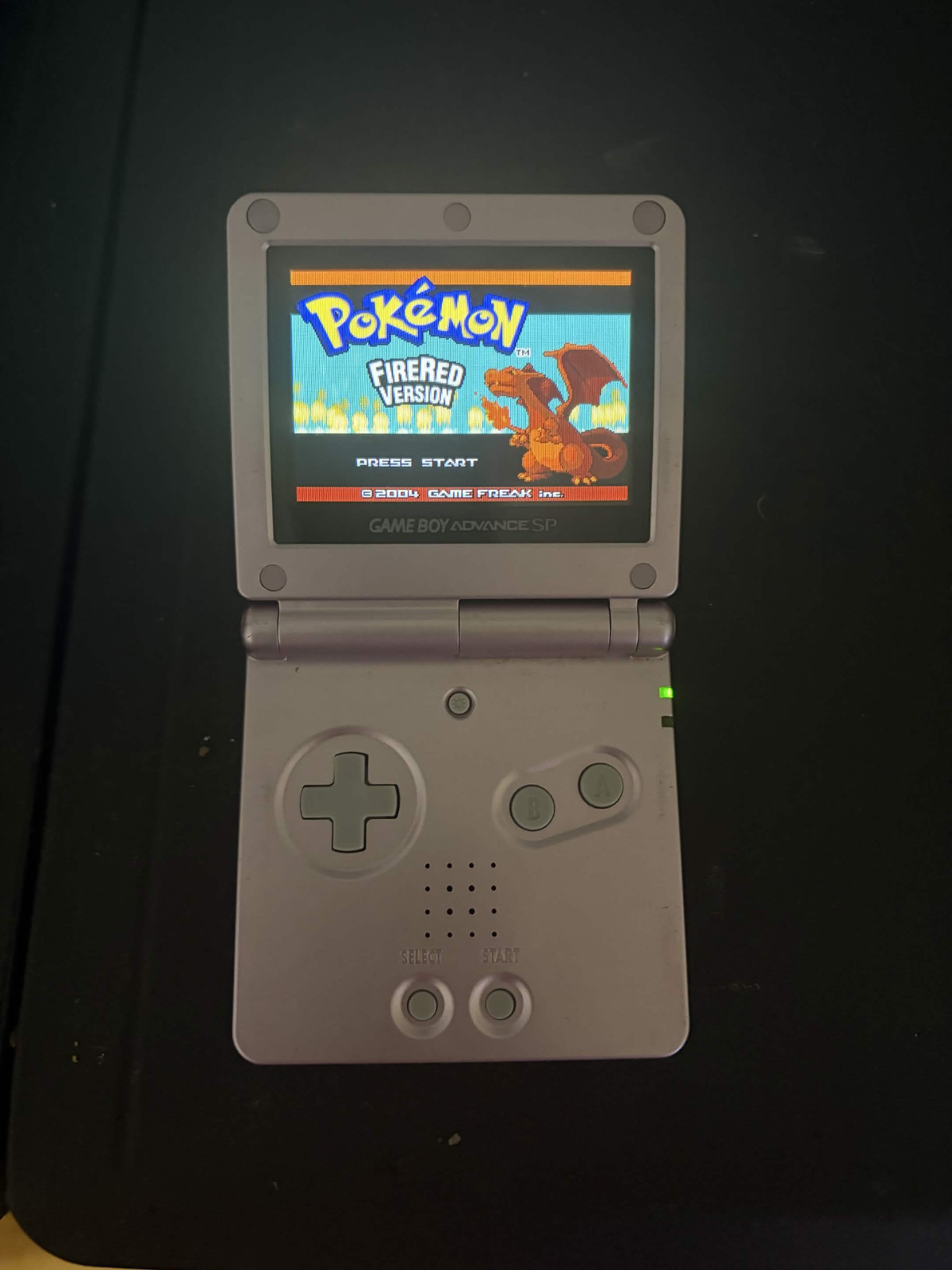 Nintendo Game Boy Advance SP Handheld System – Graphite with charger