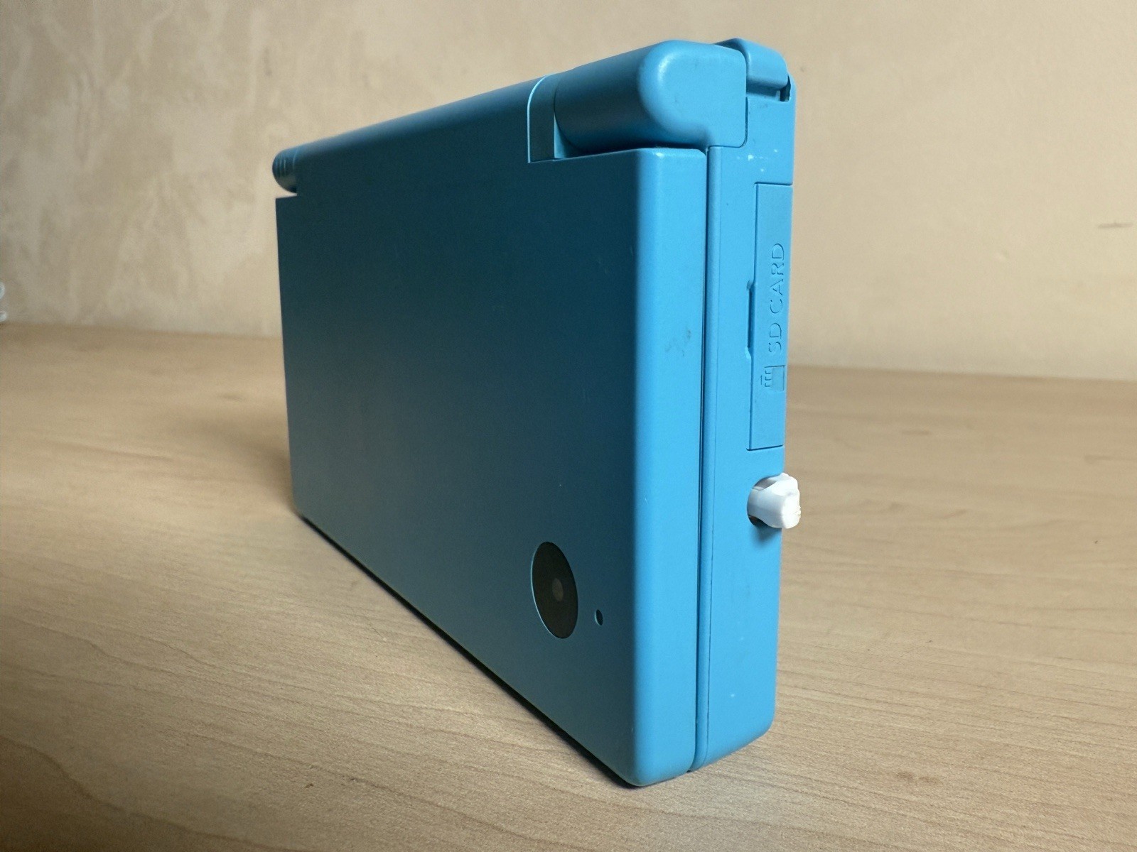 Nintendo DSi Blue Handheld Console With 5 Games, Charger, And Stylus Pack