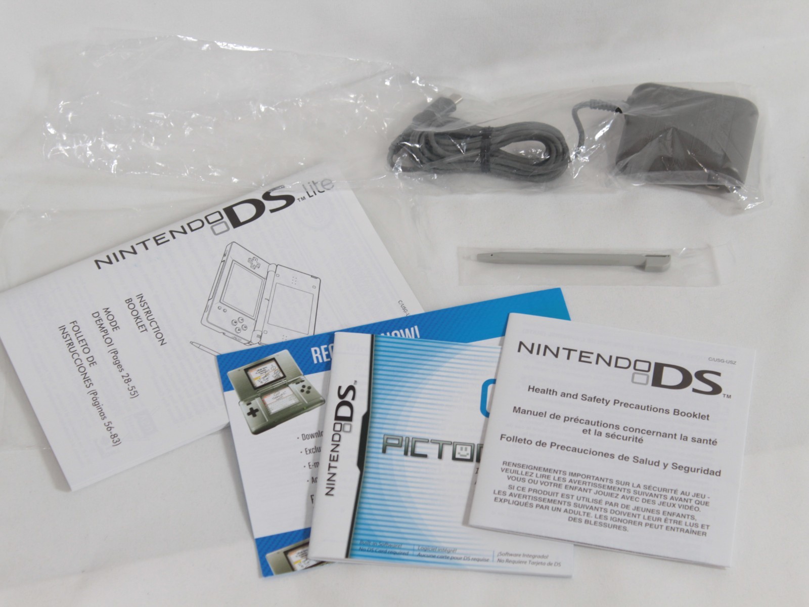 Nintendo DS Lite Handheld System Silver Never Used Never Played UNUSED/NEW COND.